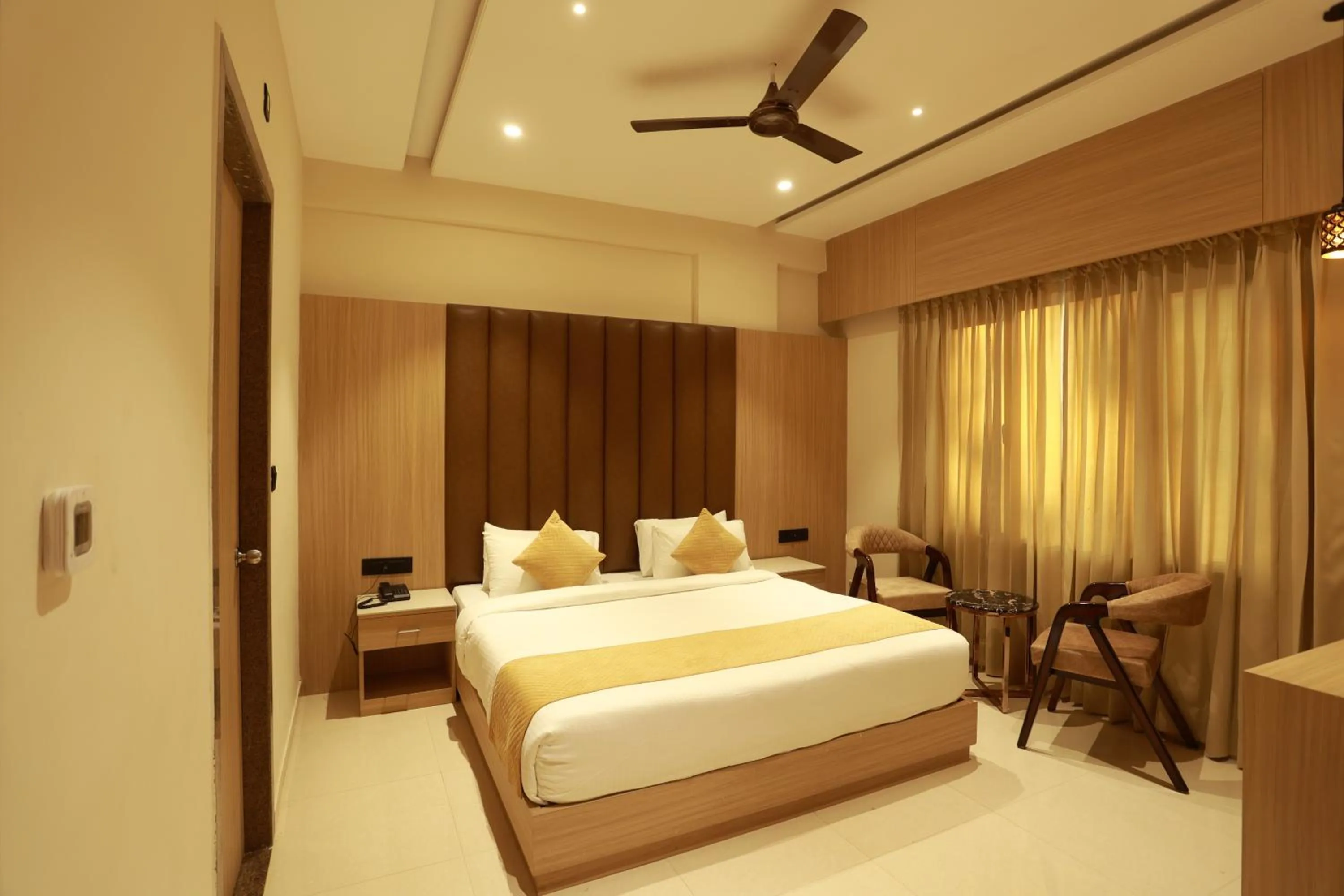 Bed in Hotel Taviral Regency