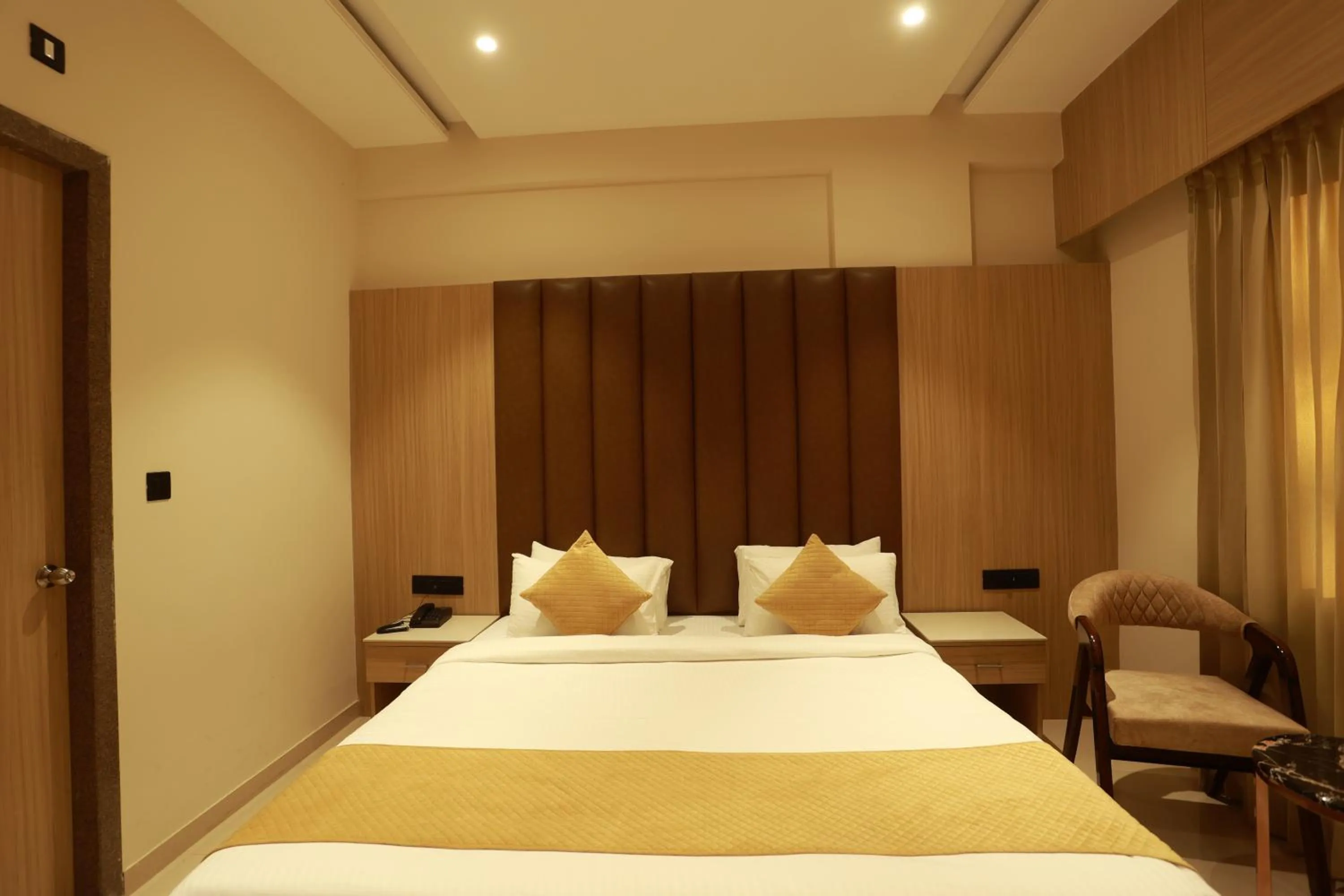 Bed in Hotel Taviral Regency