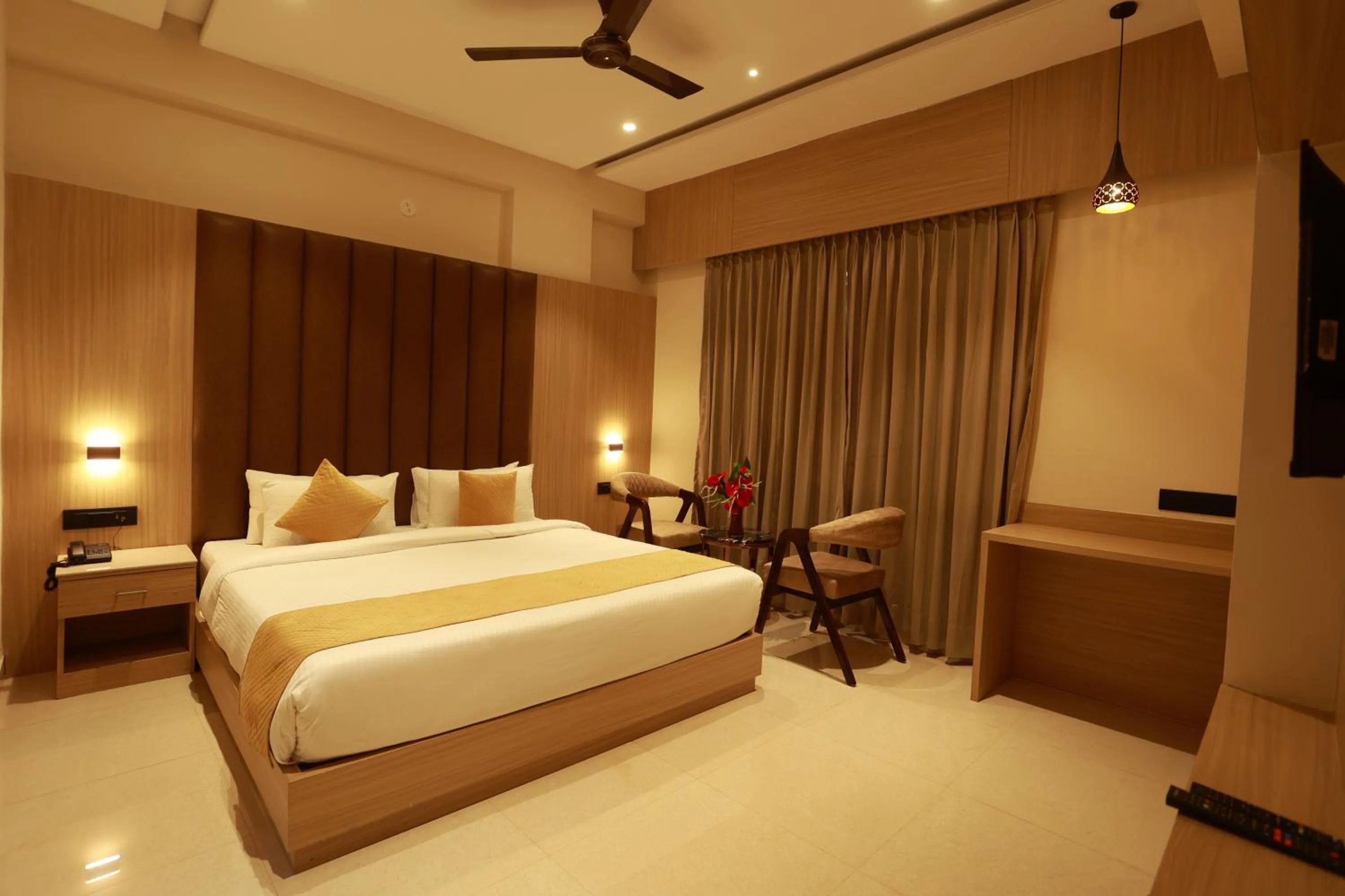 Bed in Hotel Taviral Regency