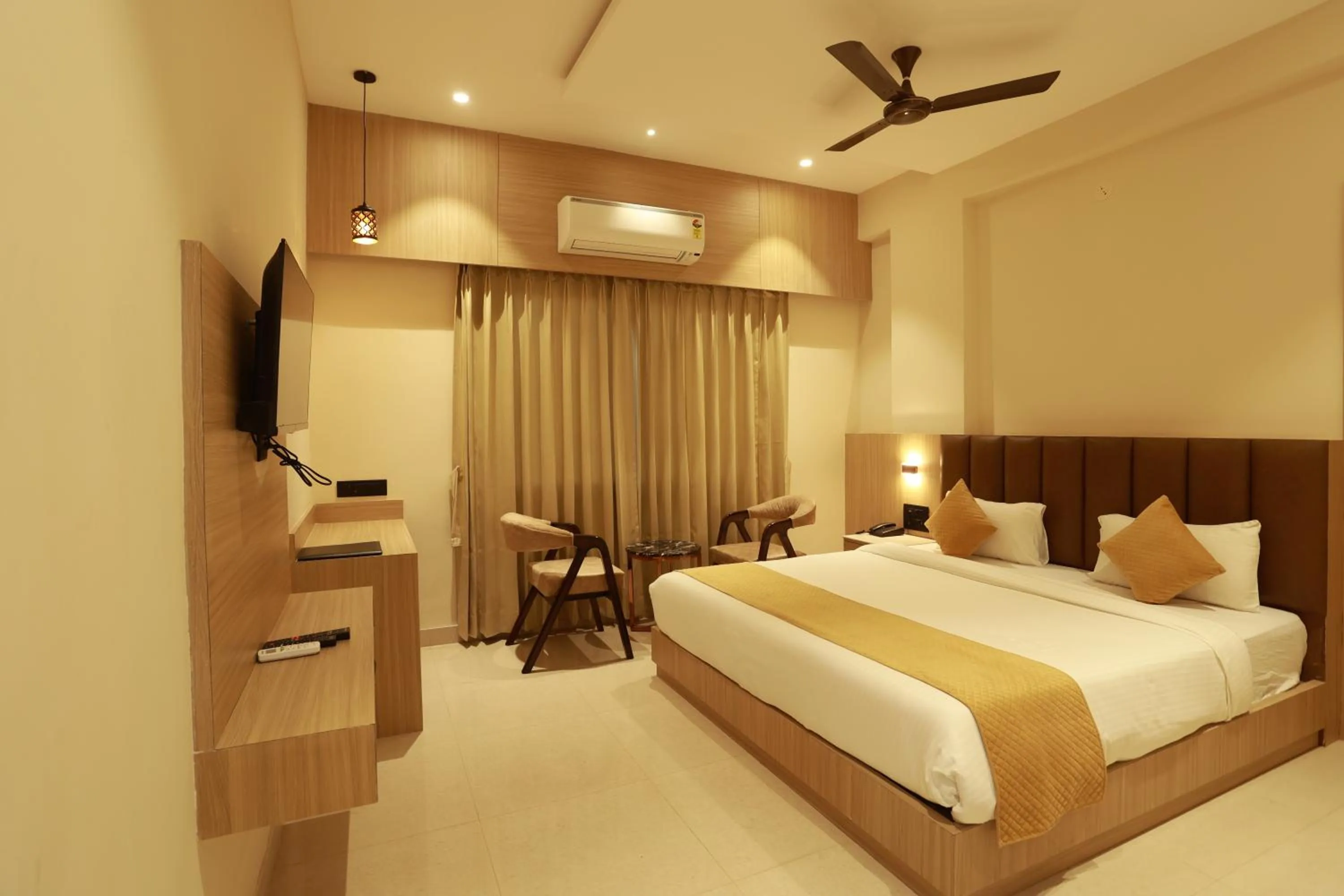 Bed in Hotel Taviral Regency