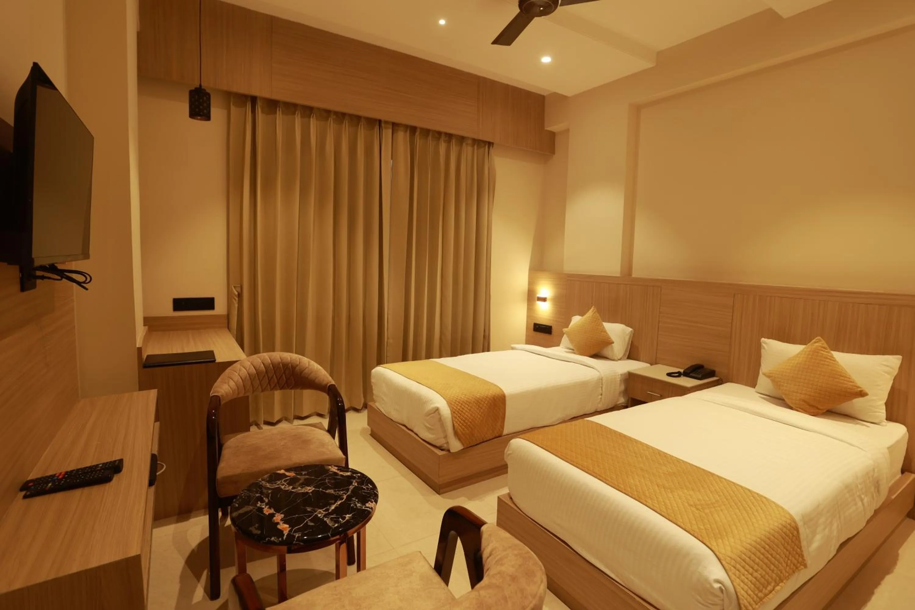 Bed in Hotel Taviral Regency