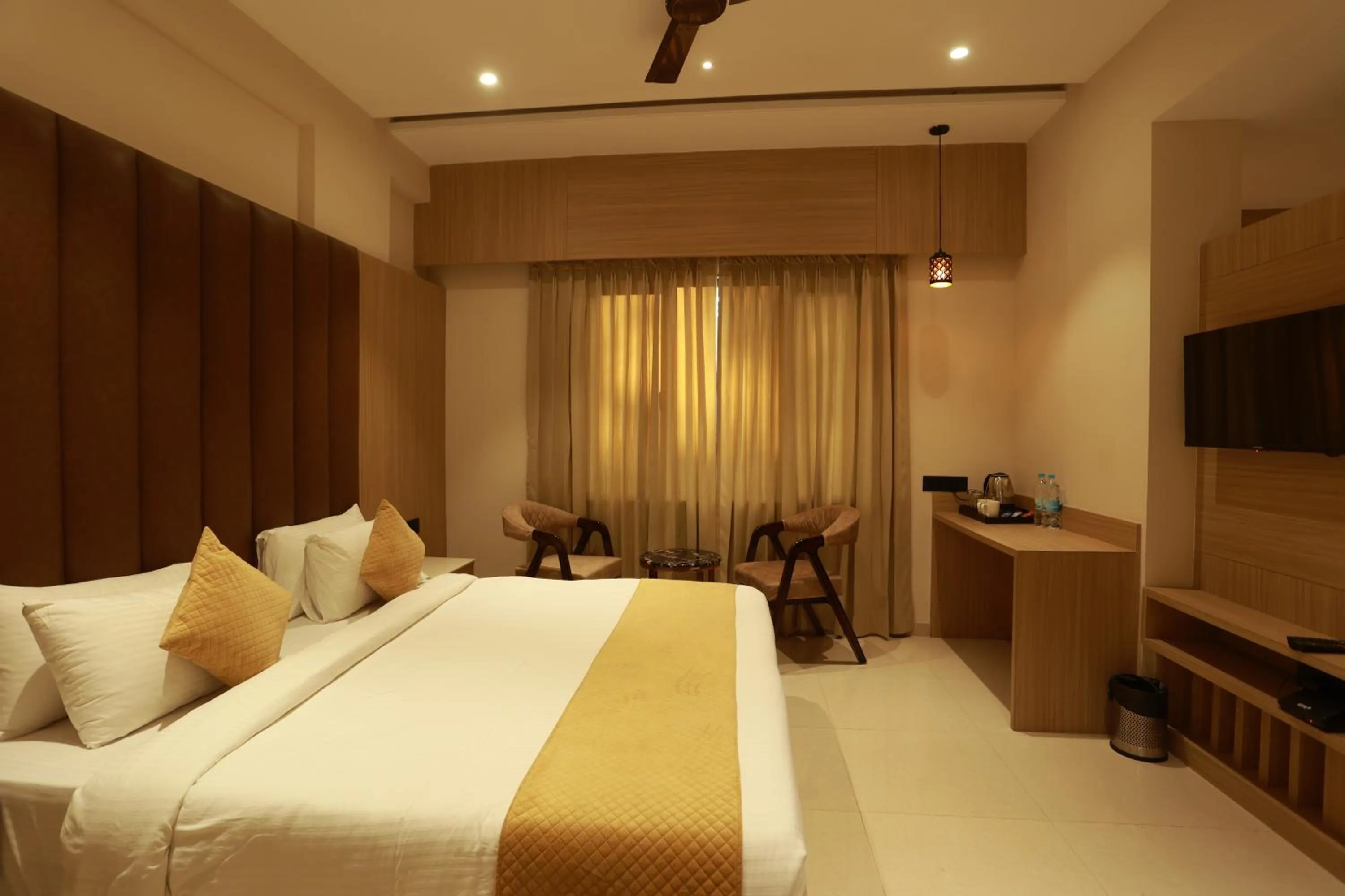 Bed in Hotel Taviral Regency