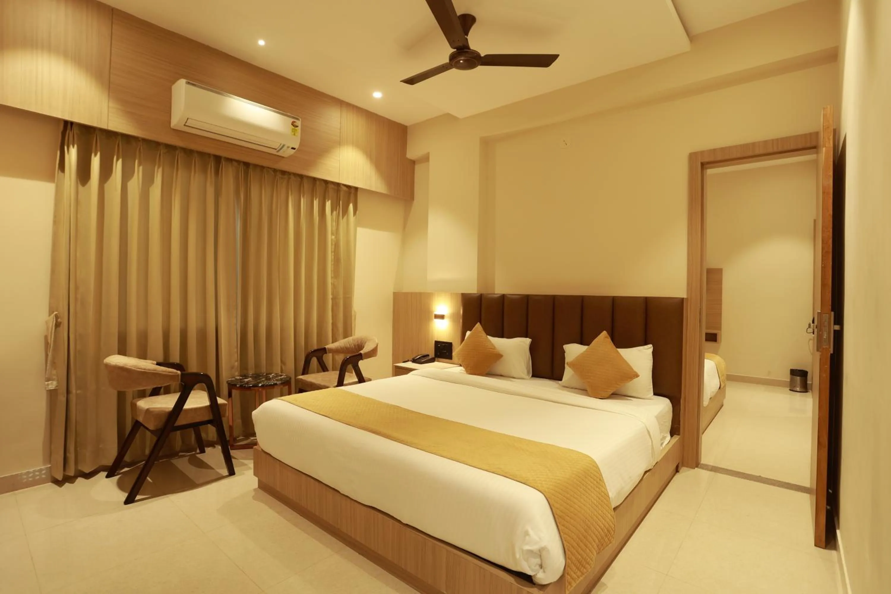 Bed in Hotel Taviral Regency