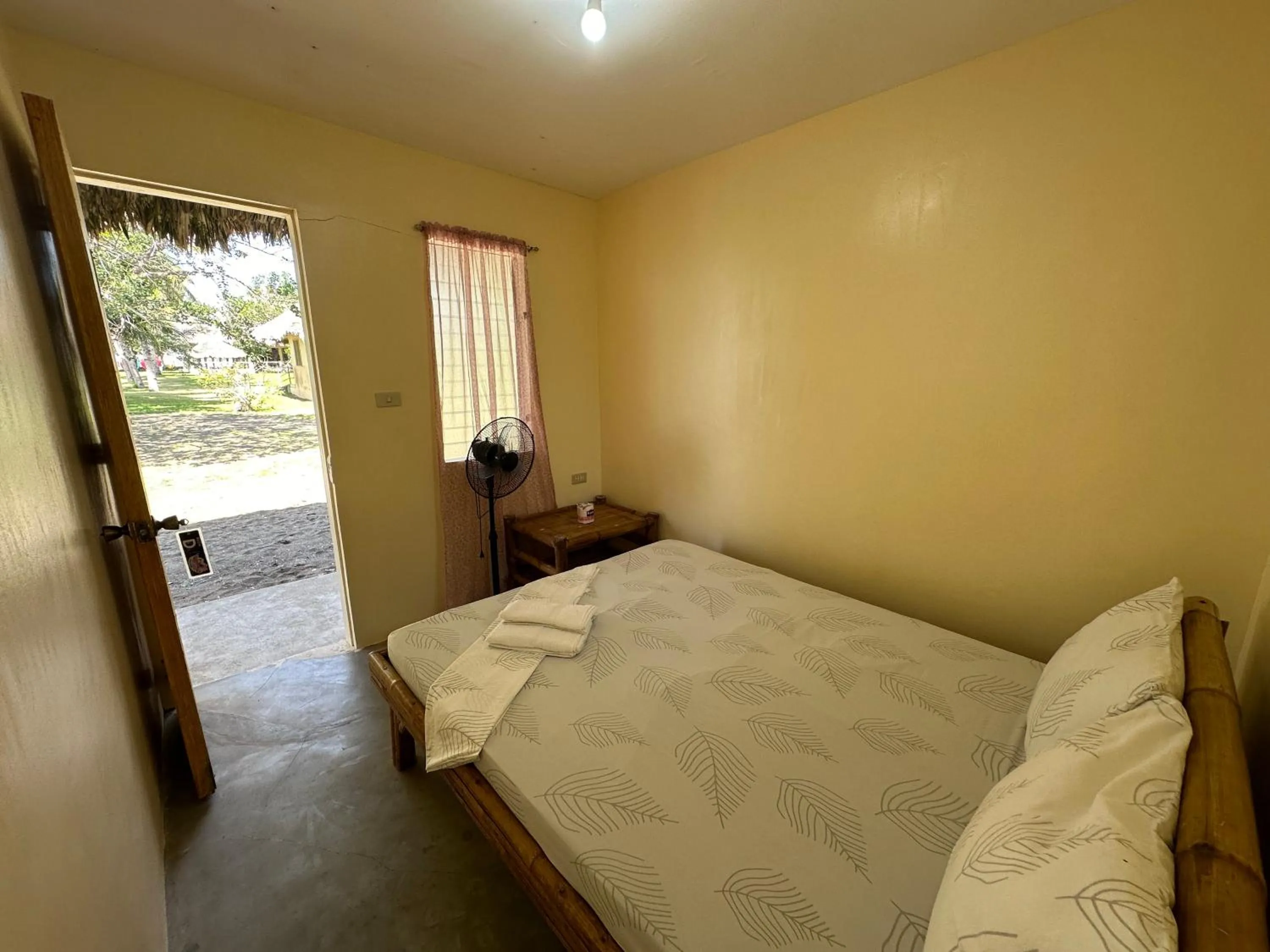 Bed in Dancalan Beach Resort