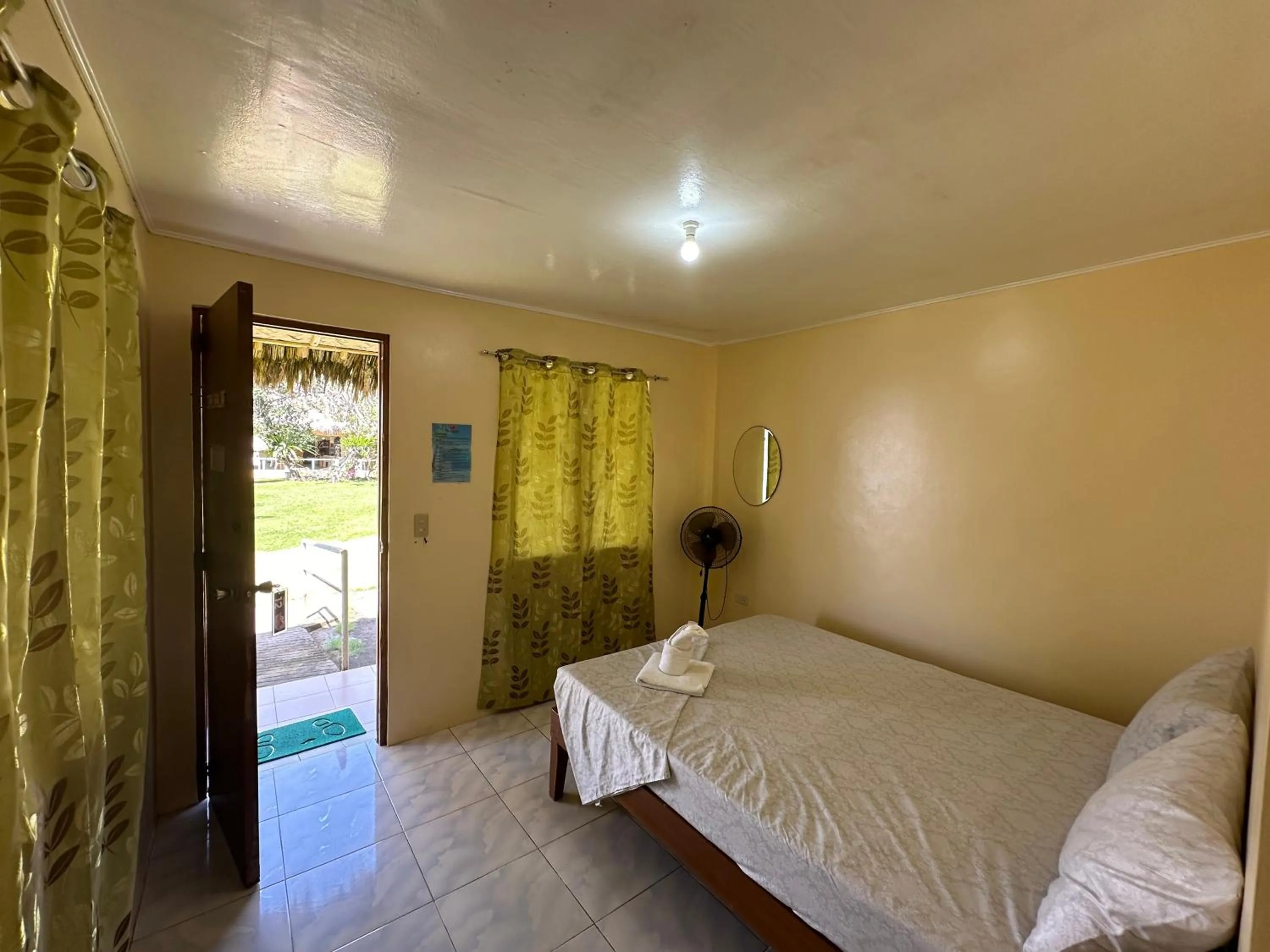 Bed in Dancalan Beach Resort