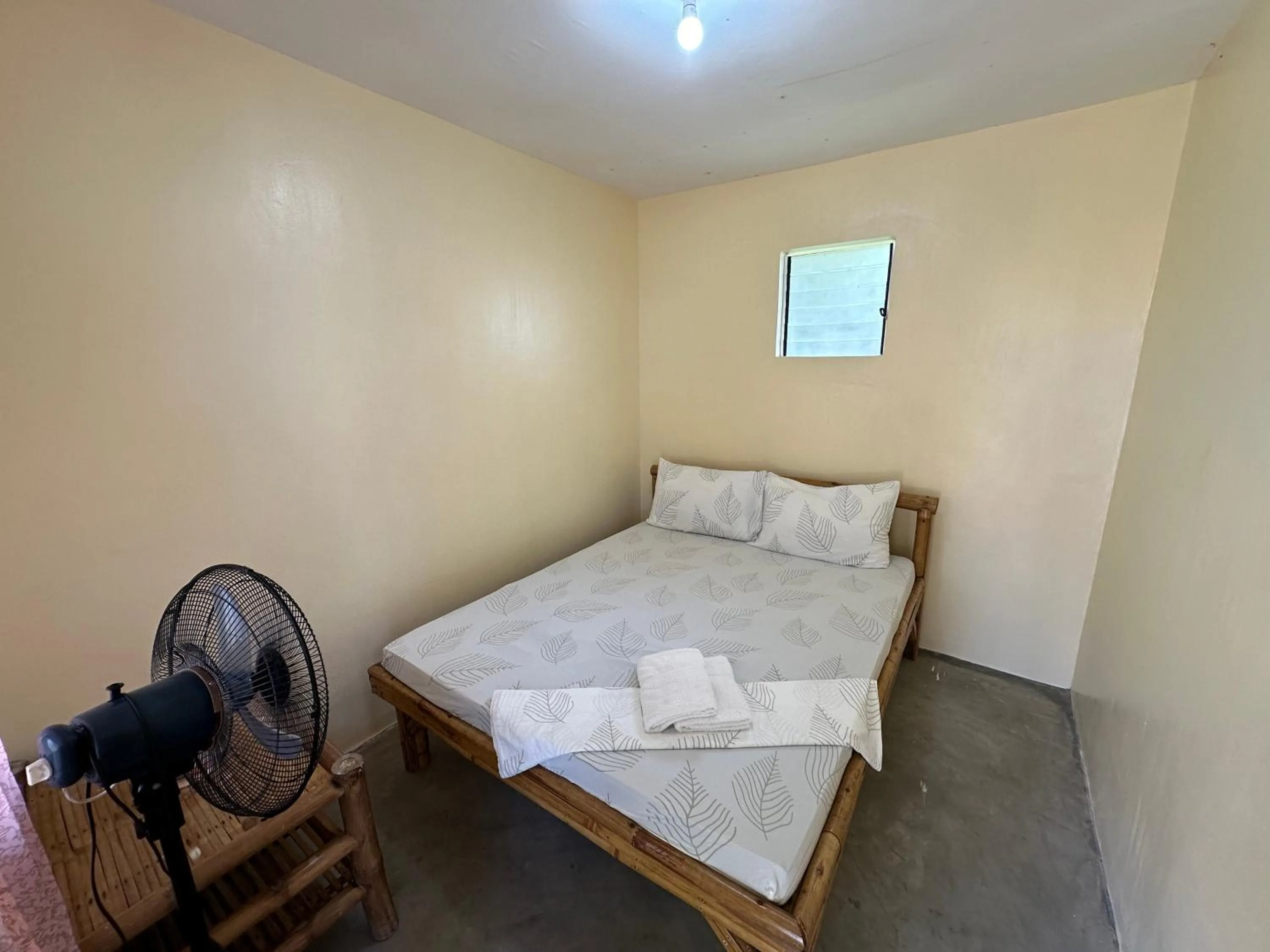 Bed in Dancalan Beach Resort