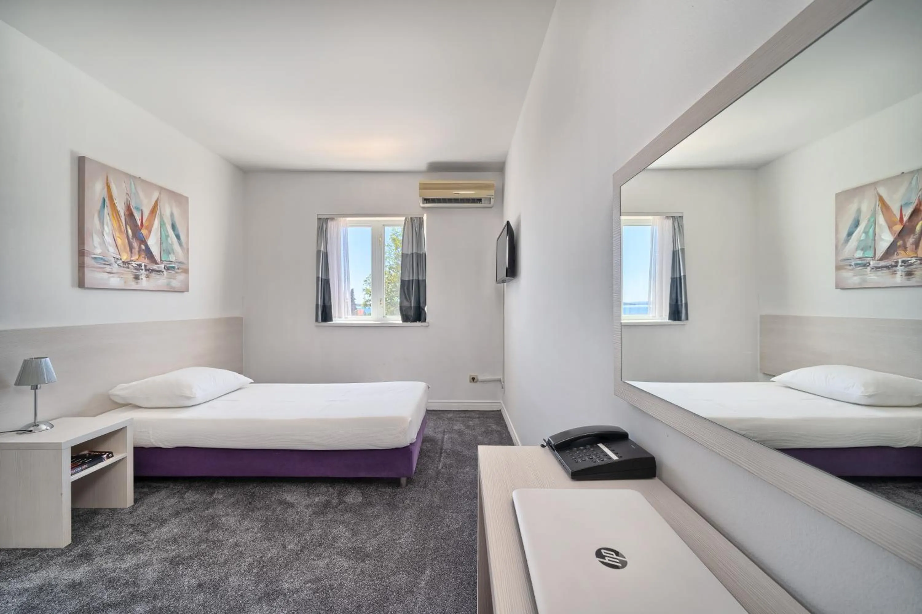 Photo of the whole room in Hotel Aqua - Guest Rooms & Suites Kaštela