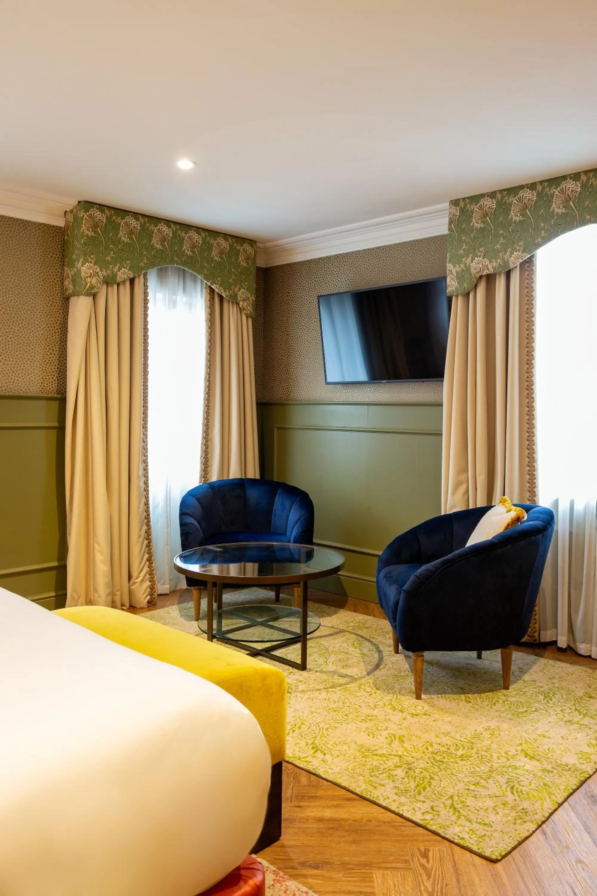 Communal lounge/ TV room in Elmbank York, Tapestry Collection by Hilton