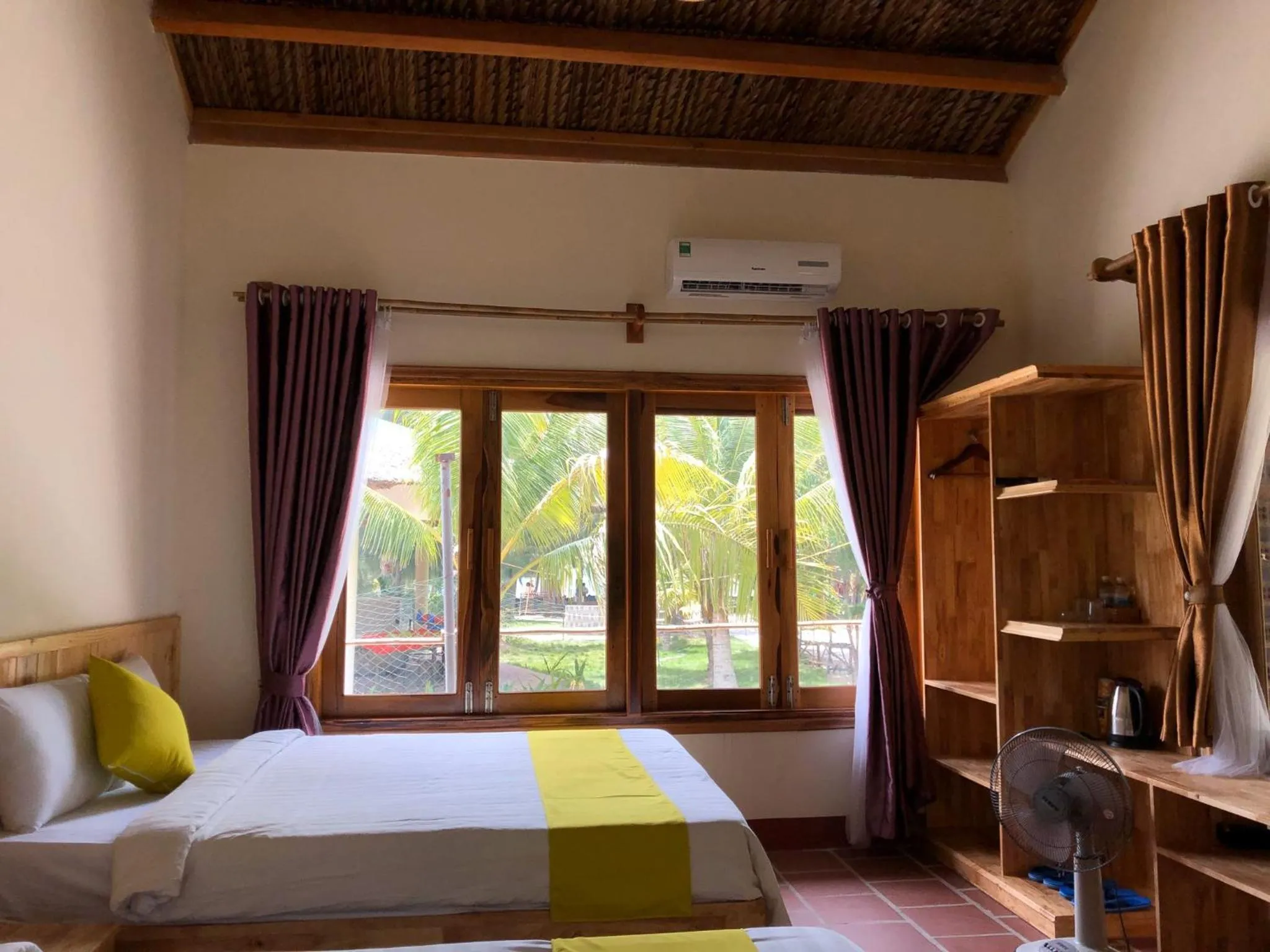 Bed in GM Doc Let Beach Resort &amp; Spa