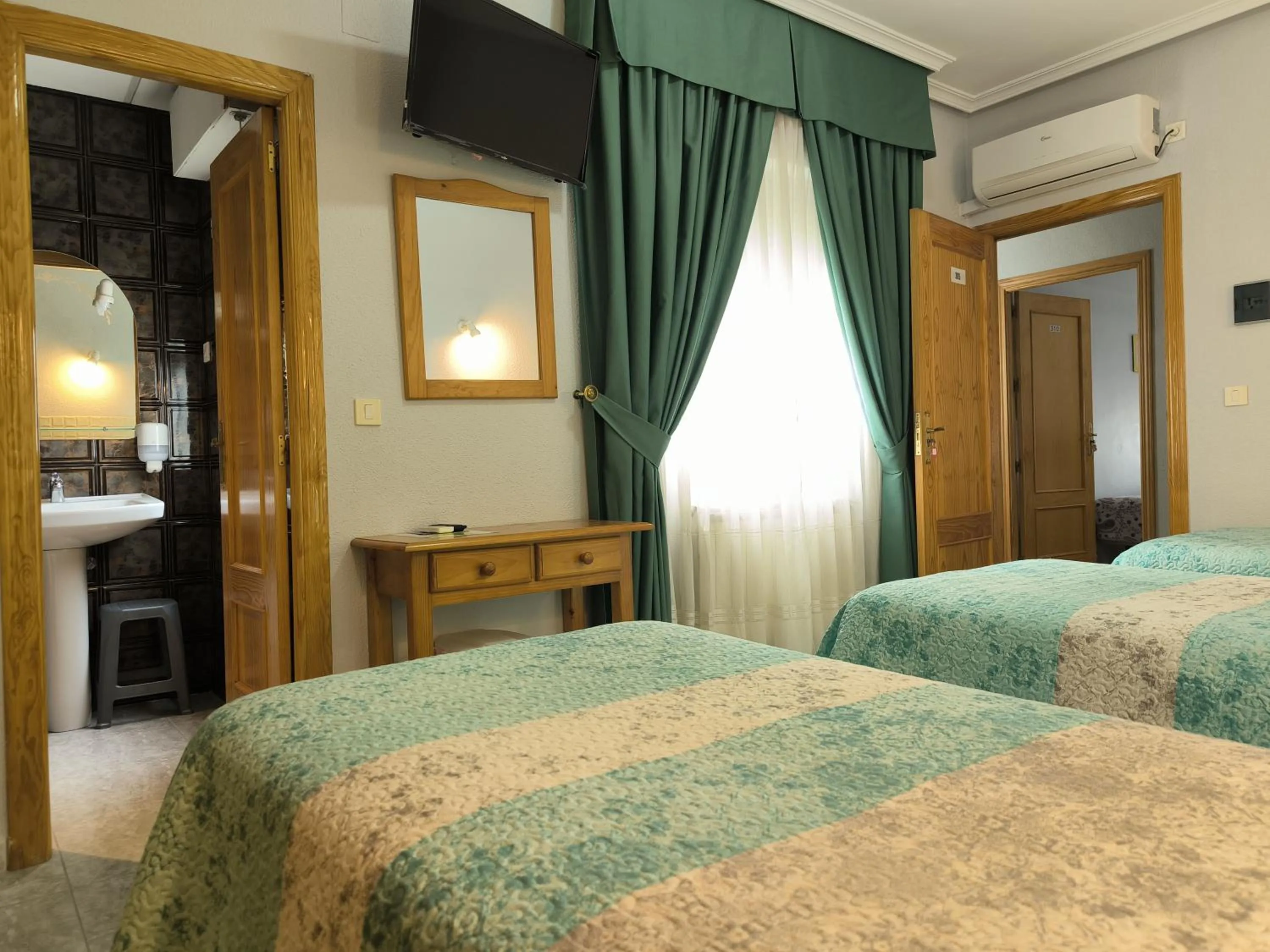 Bed in Hotel La Moraleda - Complejo Las Delicias