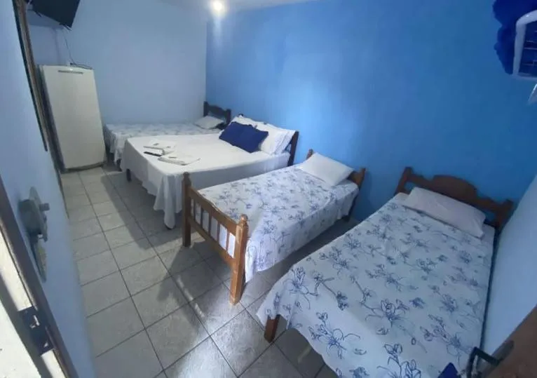 Bed in Pousada Azul do Mar
