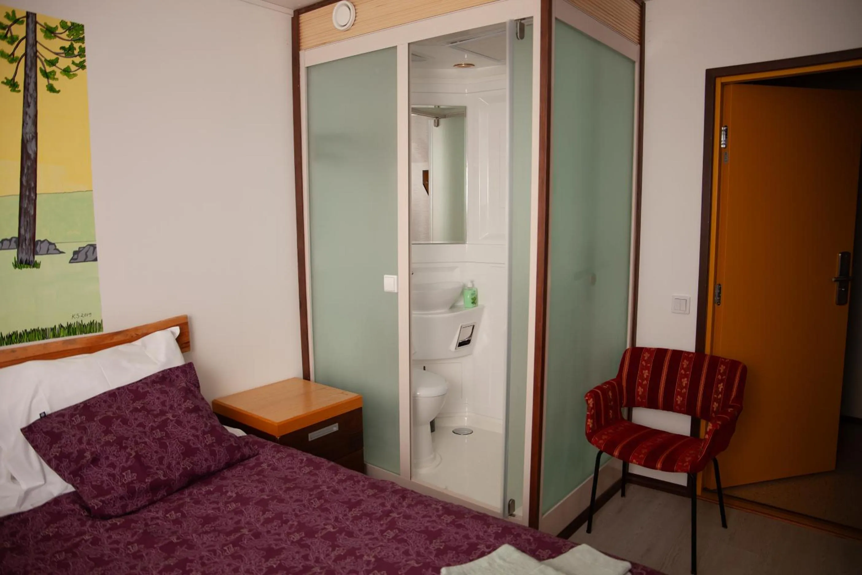 Bed in Jaala Hotel Guesthouse