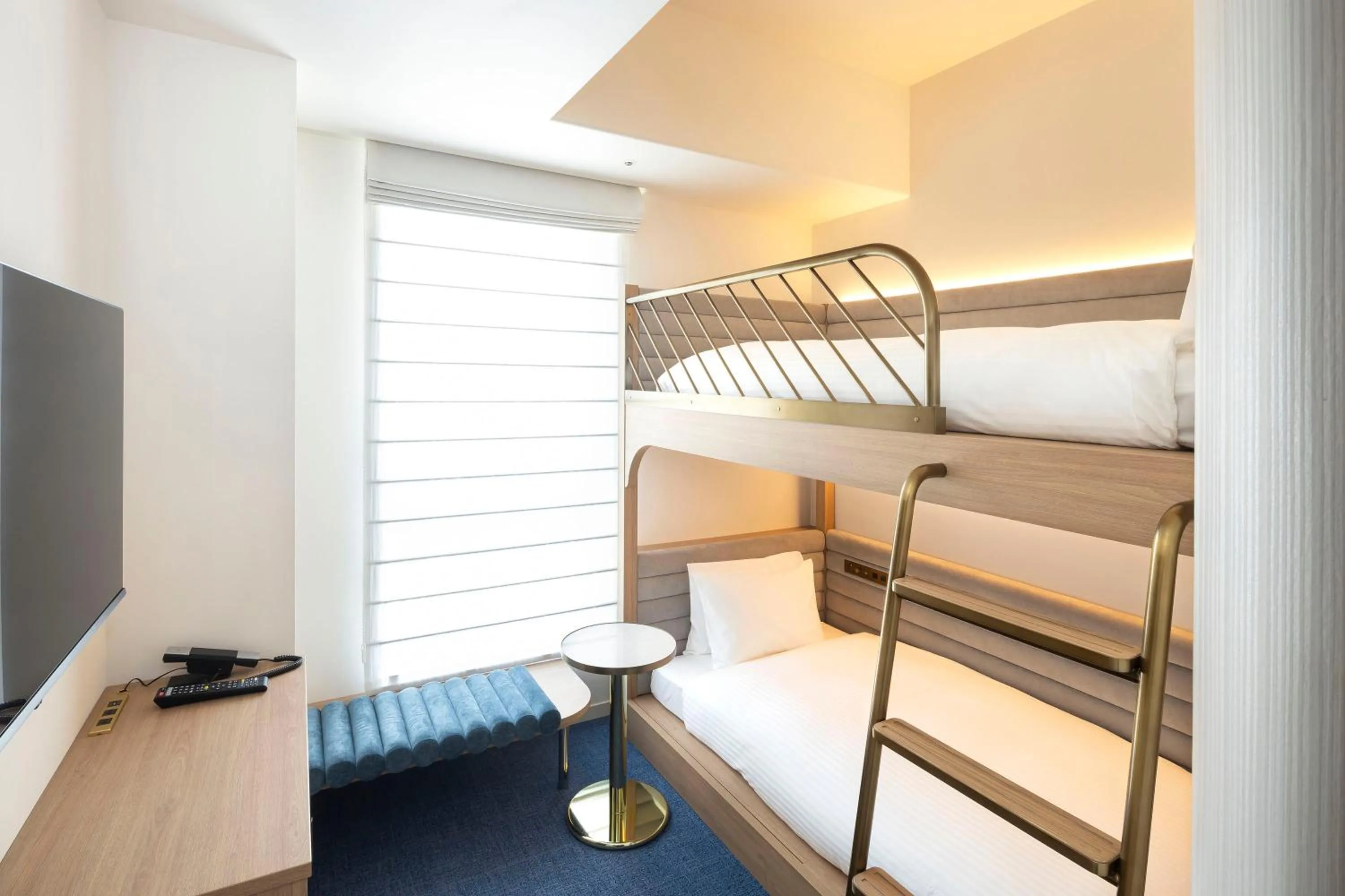 Bed in Hotel Comento Yokohama Kannai