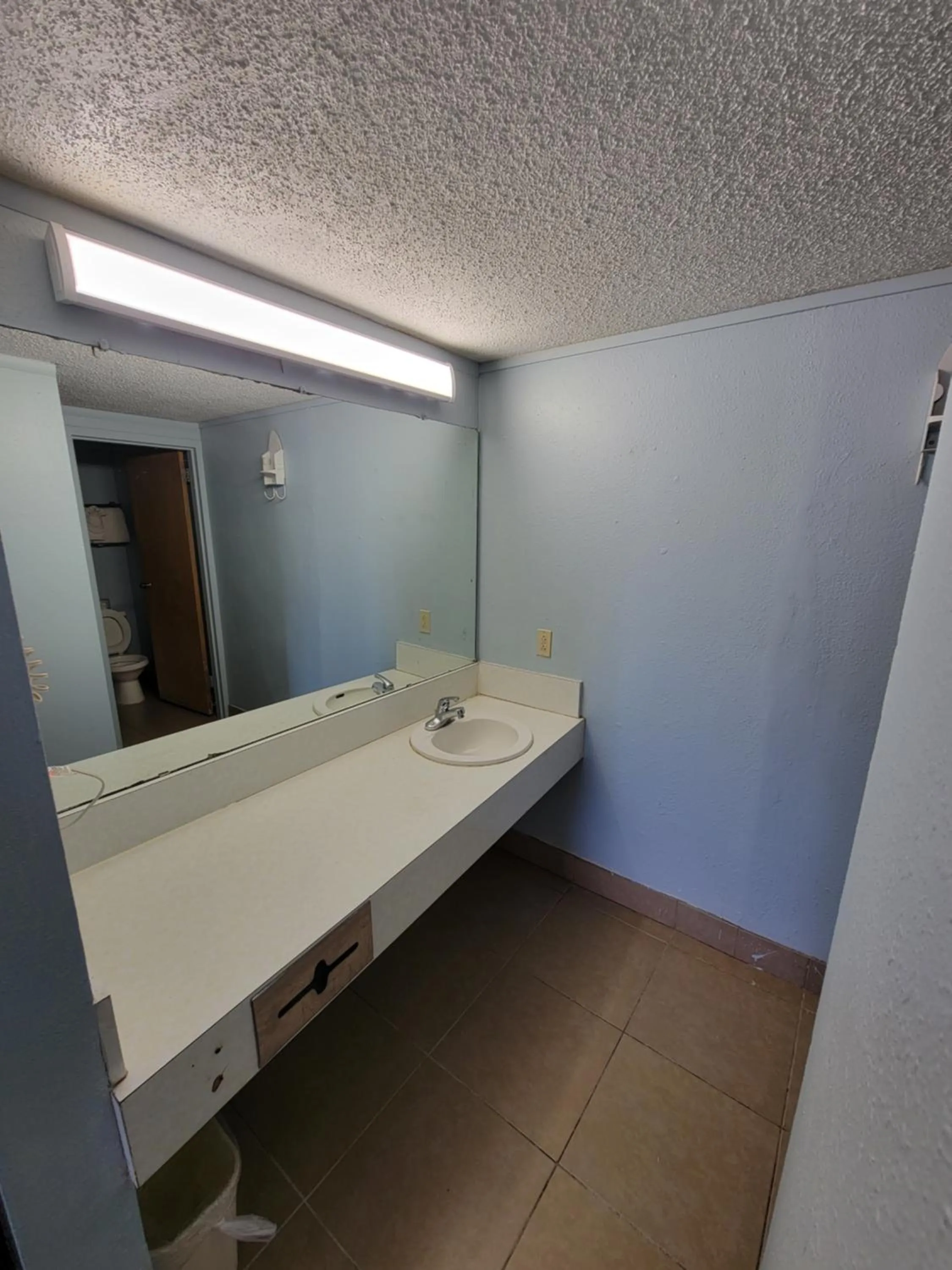 Bathroom in Travelodge by Wyndham Clovis