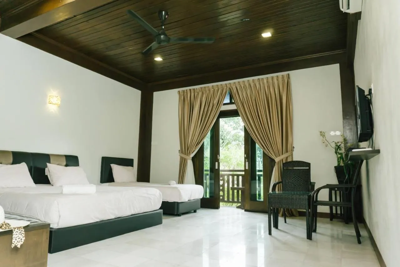 Bed in Singgahsana Villa Langkawi