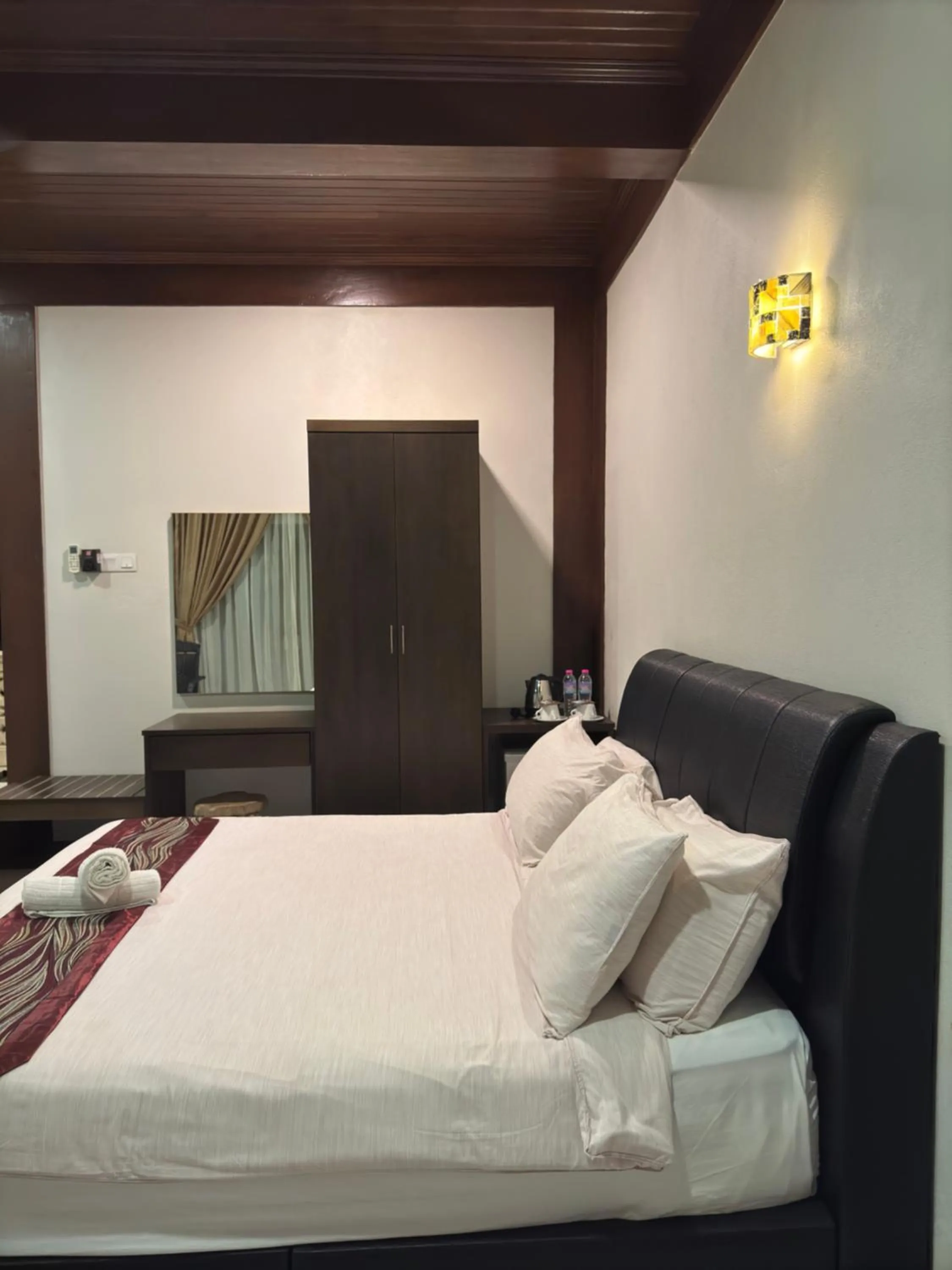 Bed in Singgahsana Villa Langkawi