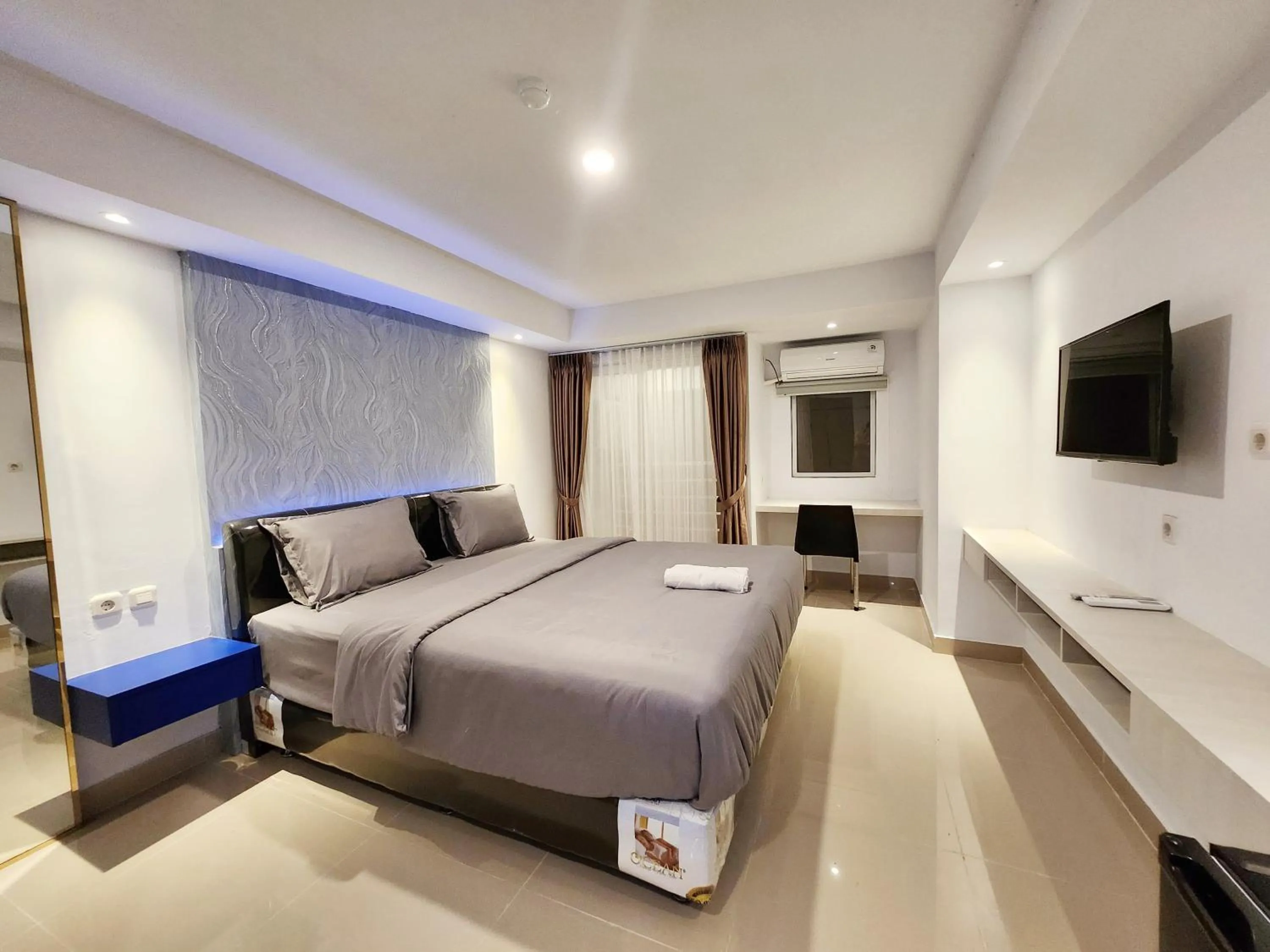 Bed in Alhesa Apartment