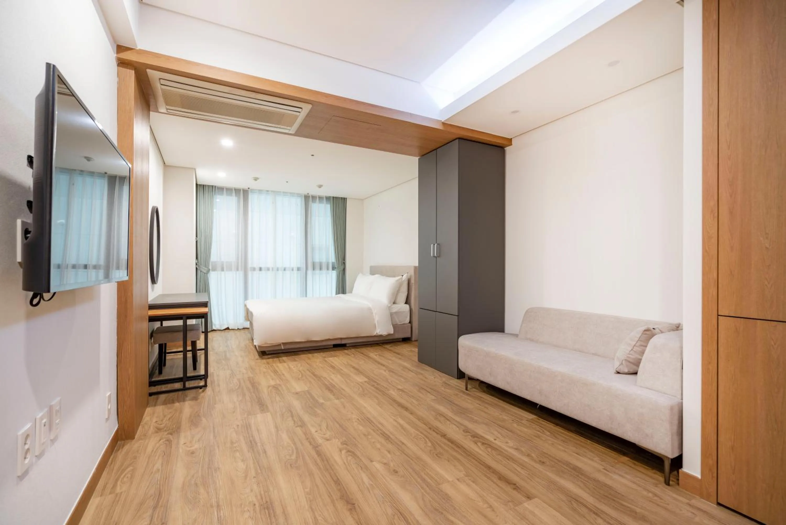 TV and multimedia, Bed in Centum Convention Hotel In Centum