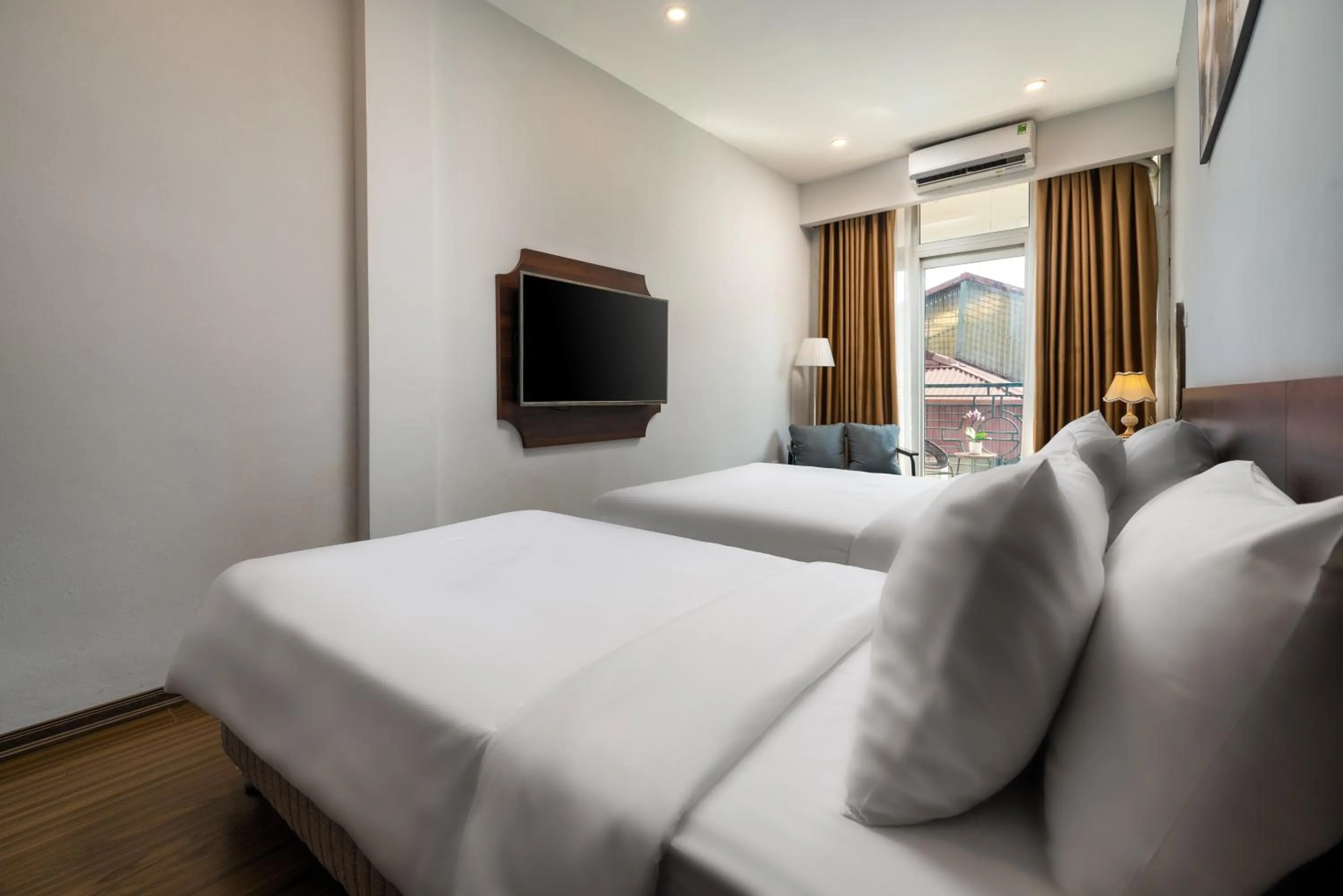 Bed in Astoria Hanoi Hotel & Travel