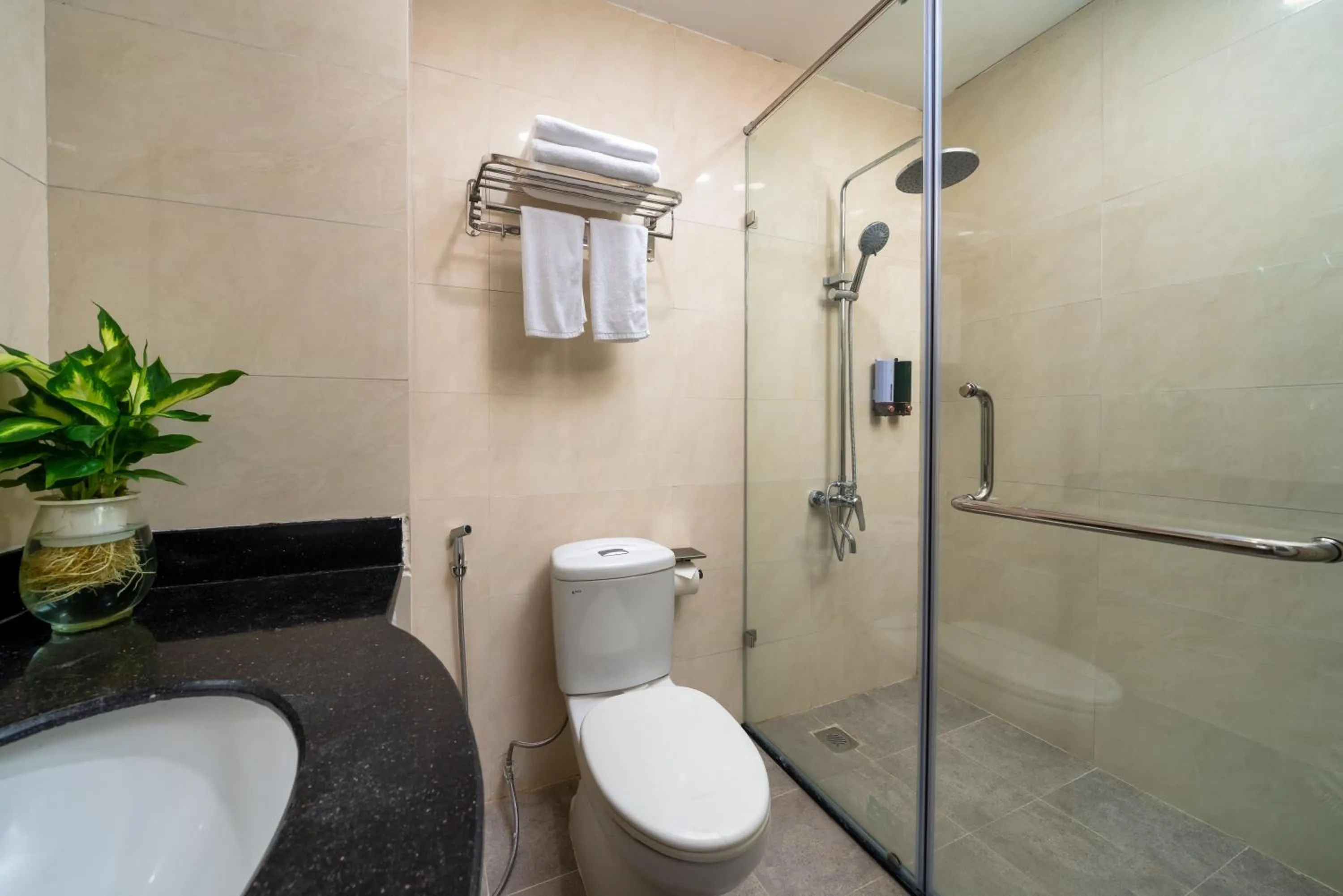 Shower in Astoria Hanoi Hotel & Travel