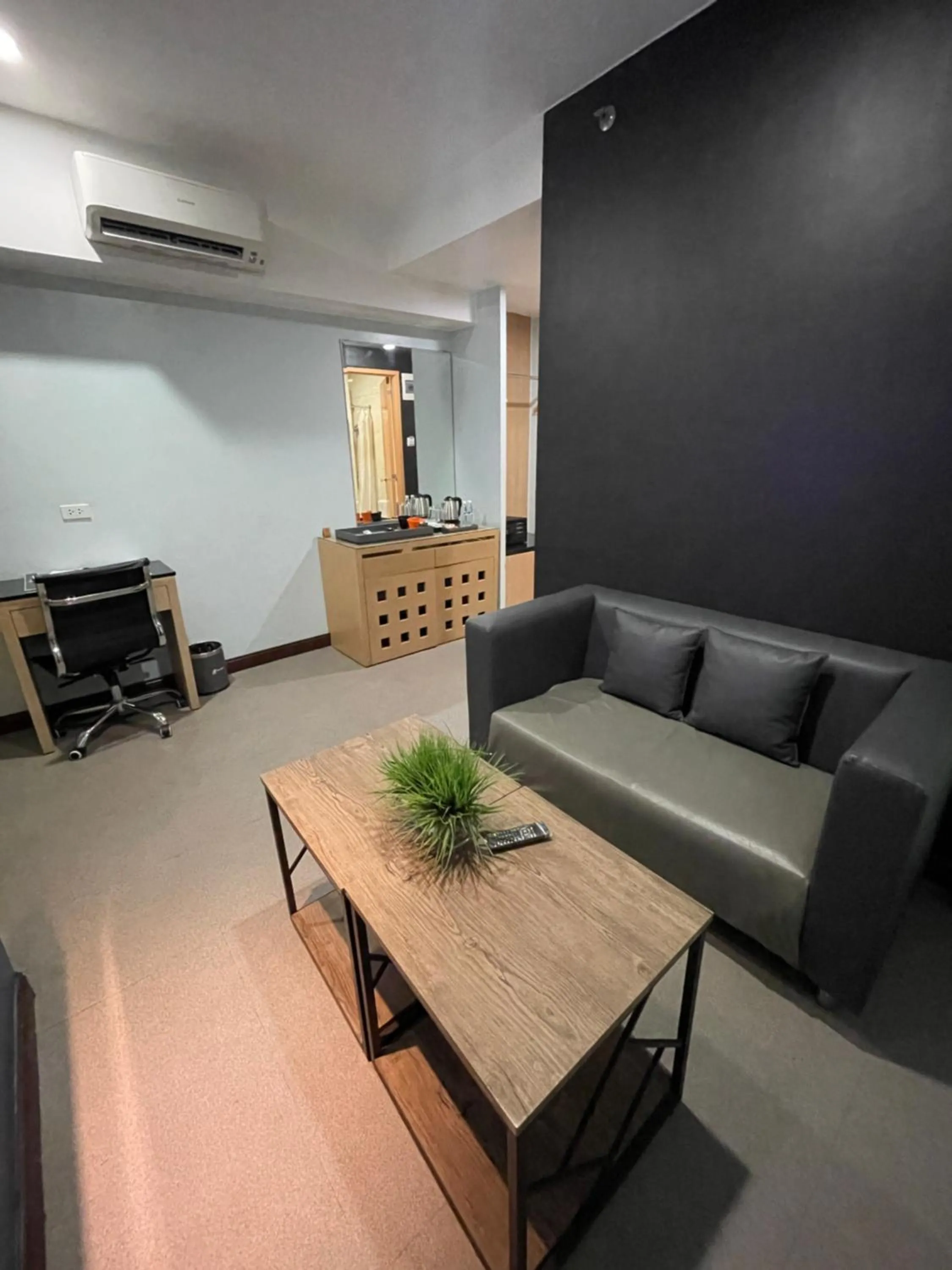 Living room in Homes at Bay Area Suites by SMS Hospitality