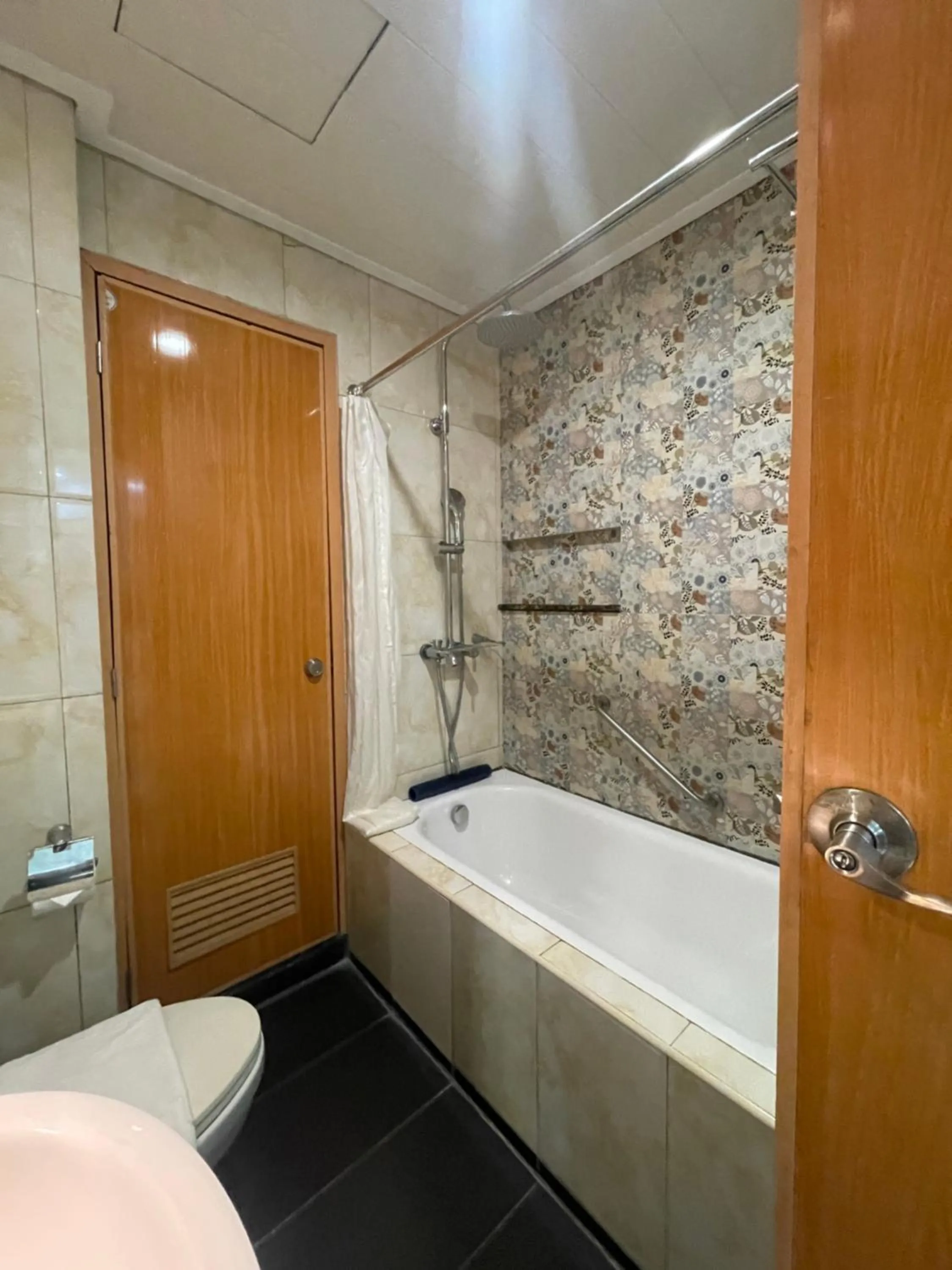 Shower in Homes at Bay Area Suites by SMS Hospitality