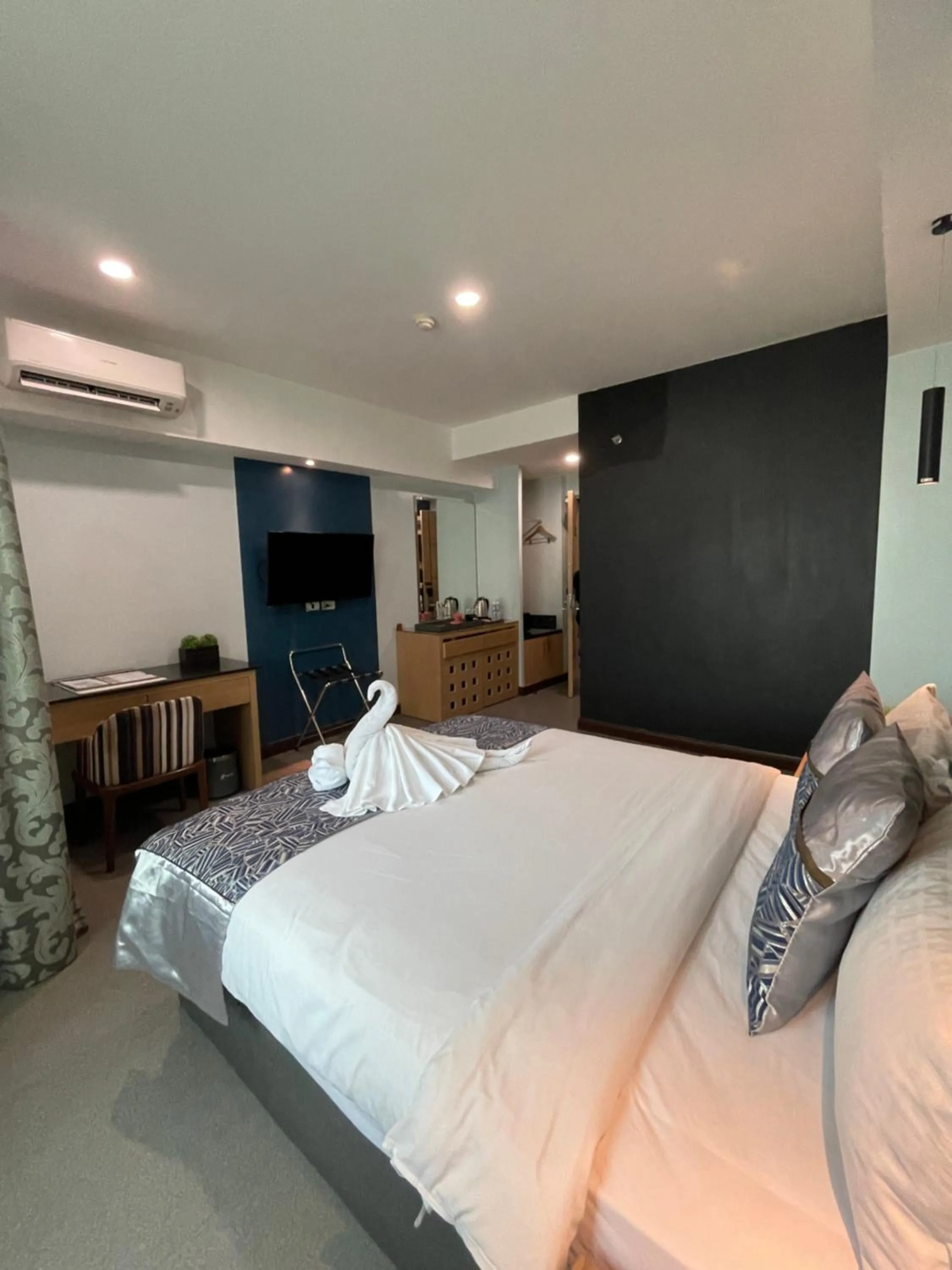 Bed in Homes at Bay Area Suites by SMS Hospitality