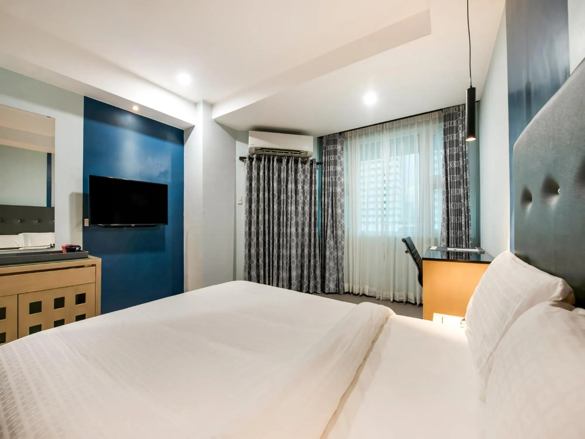 Bed in Homes at Bay Area Suites by SMS Hospitality