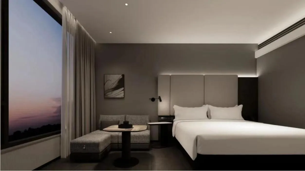 Photo of the whole room, Bed in Atour Hotel Xujiahui Meiying