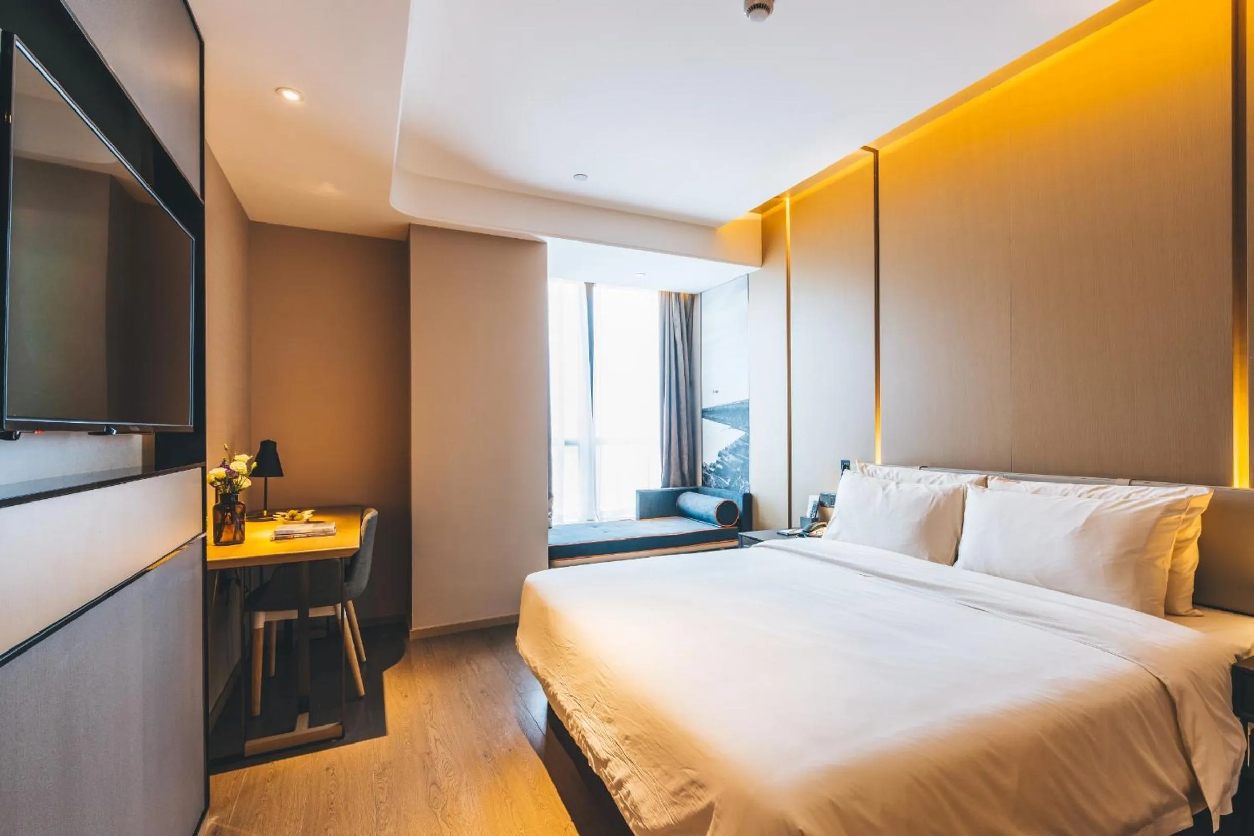 Bed in Atour Hotel Hangzhou Binjiang Olympic Sports