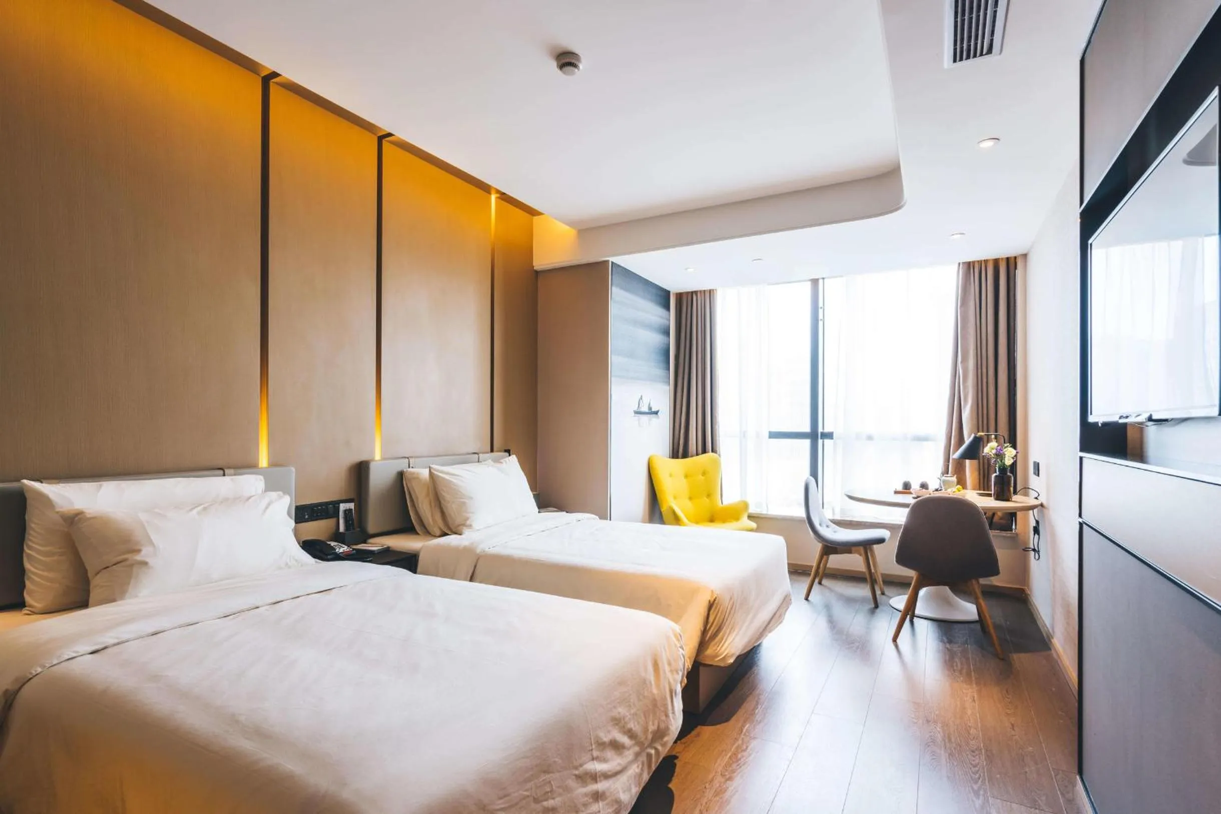 Bed in Atour Hotel Hangzhou Binjiang Olympic Sports