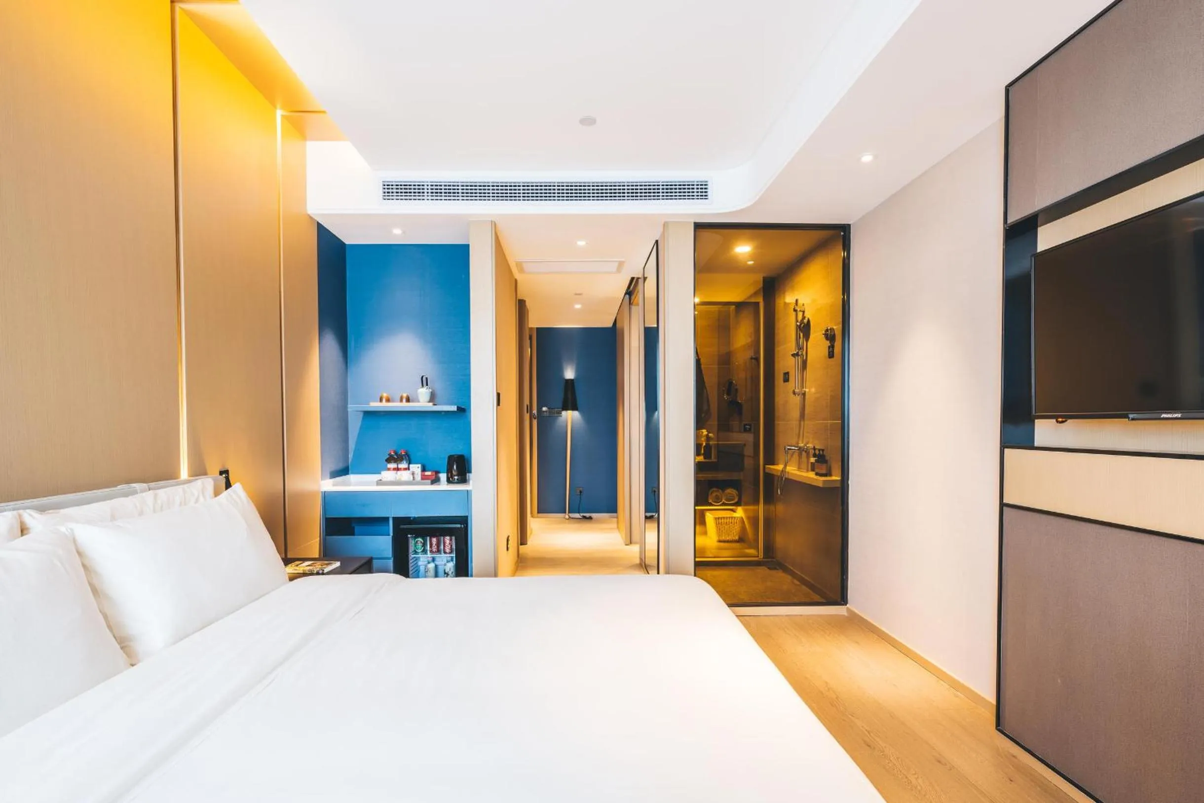 Bed in Atour Hotel Hangzhou Binjiang Olympic Sports