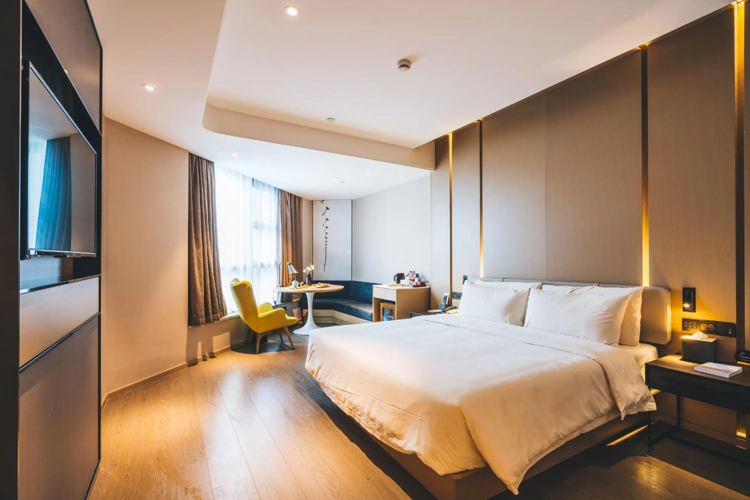 Bed in Atour Hotel Hangzhou Binjiang Olympic Sports