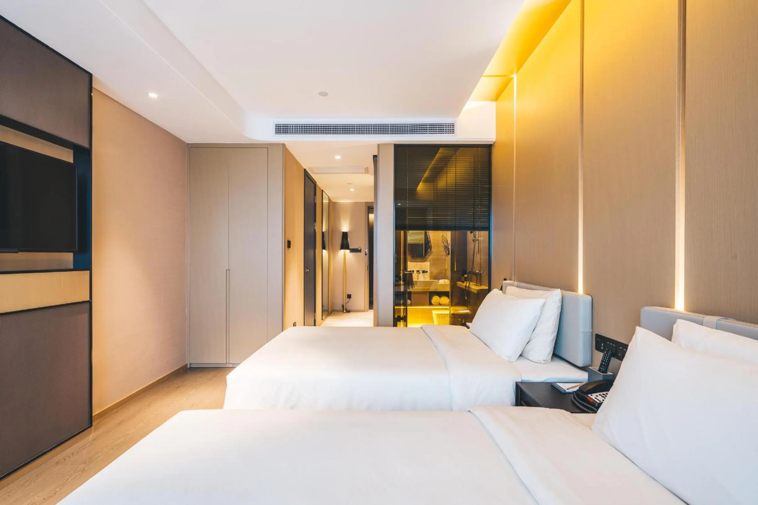 Bed in Atour Hotel Hangzhou Binjiang Olympic Sports