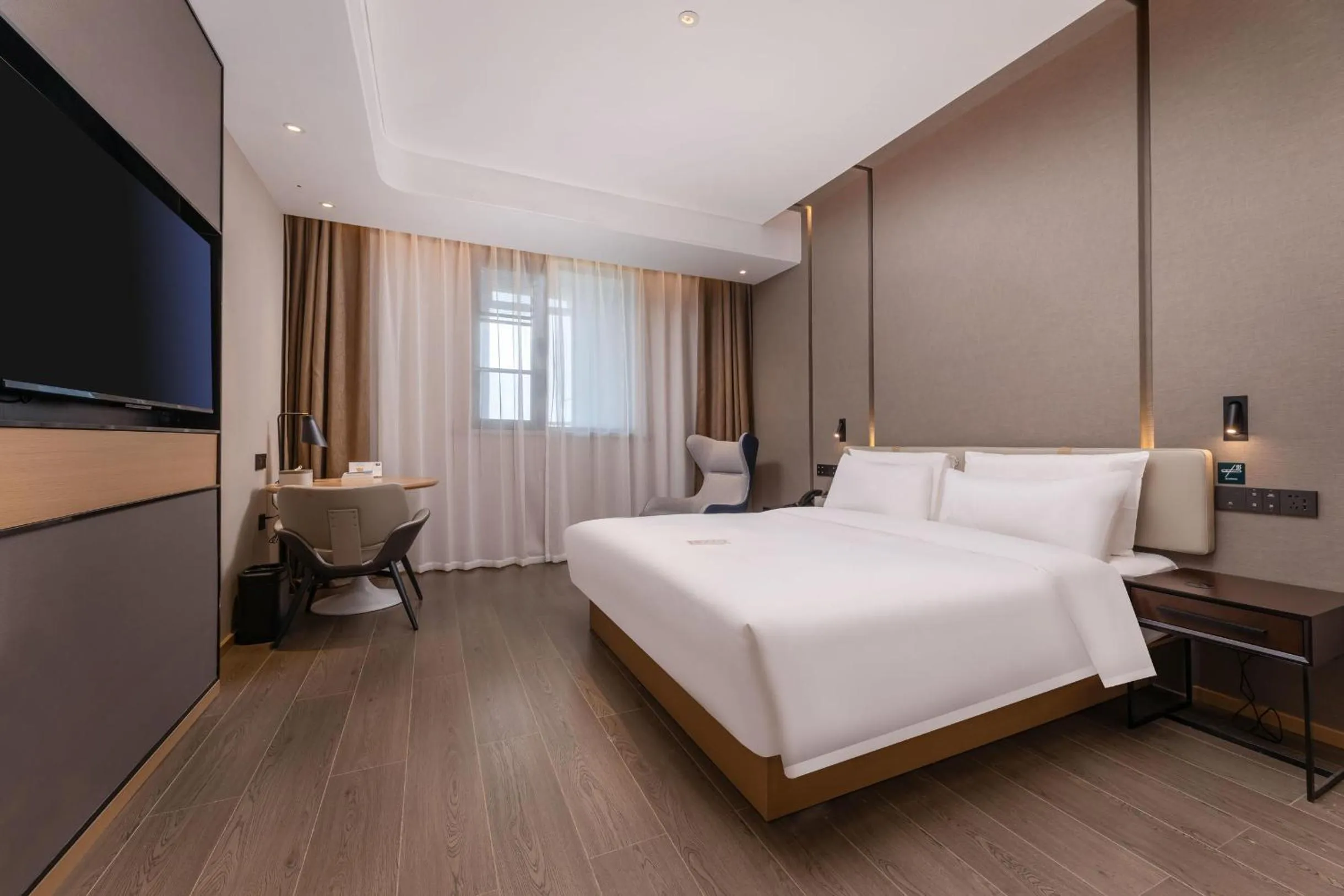 Bed in Atour Hotel Zhijiang Bridge