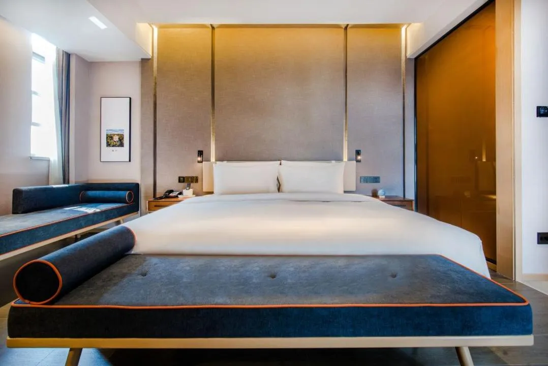 Photo of the whole room, Bed in Atour Hotel Zhongshan Tanzhou