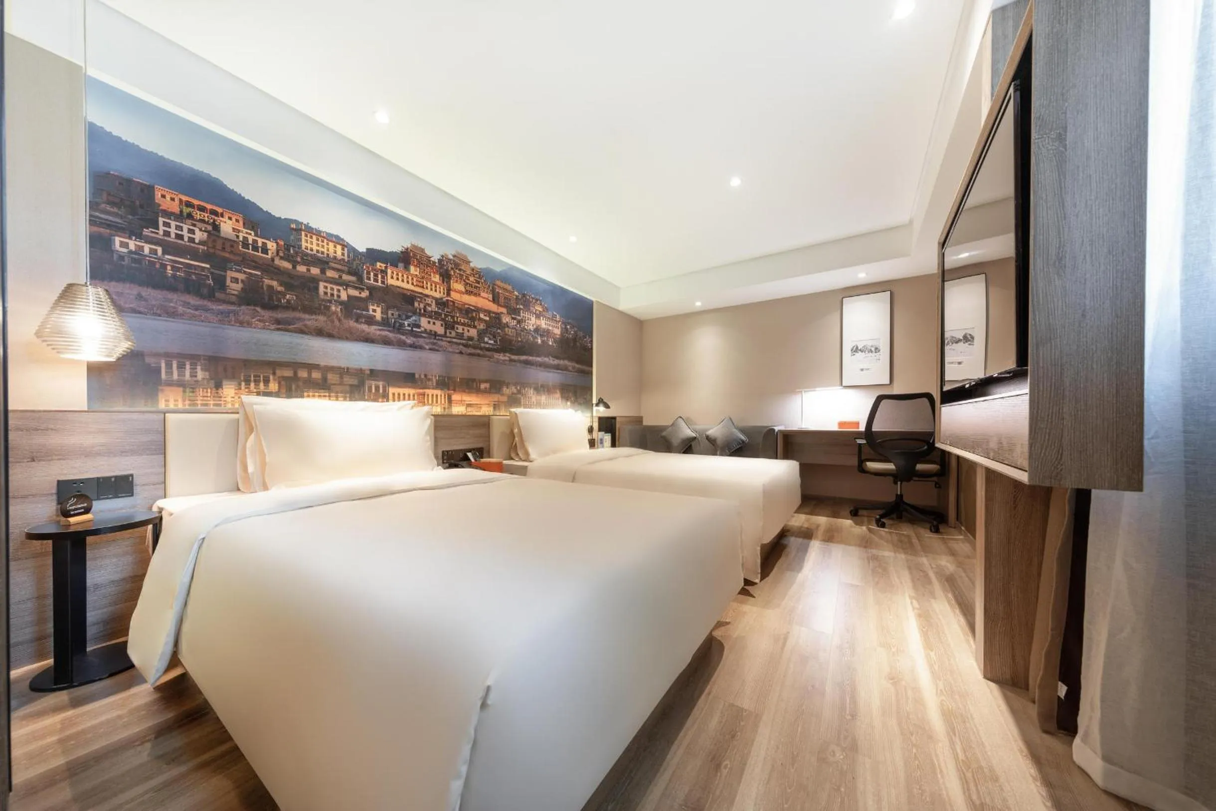 Bed in Atour Hotel Kunming South High Speed ​​Railway Station University Town