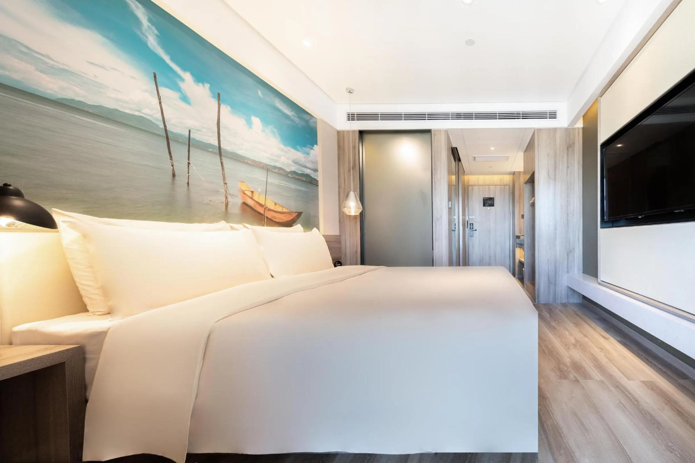 Bed in Atour Hotel Kunming South High Speed ​​Railway Station University Town