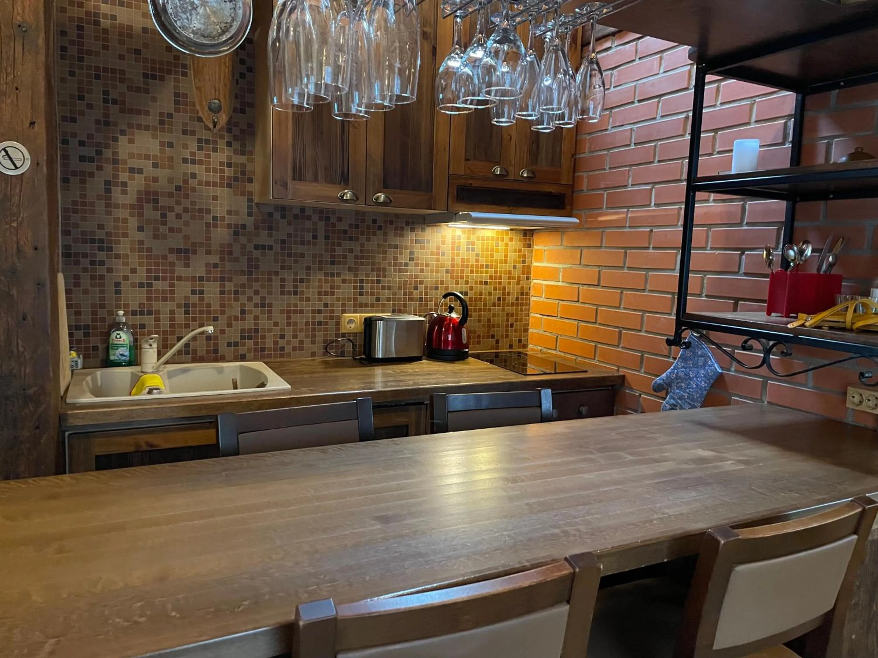 Kitchen or kitchenette in Kauba Apartment