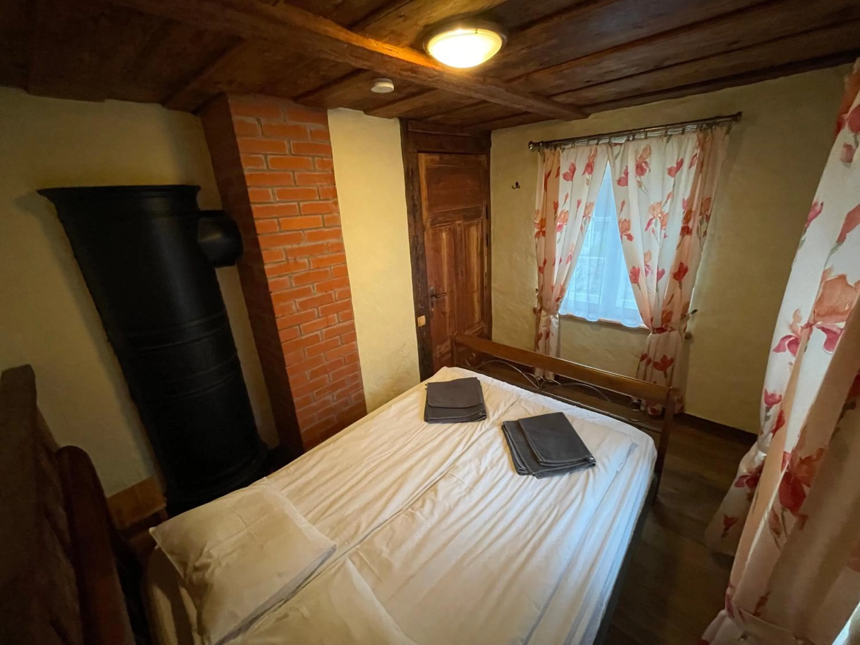 Bed in Kauba Apartment
