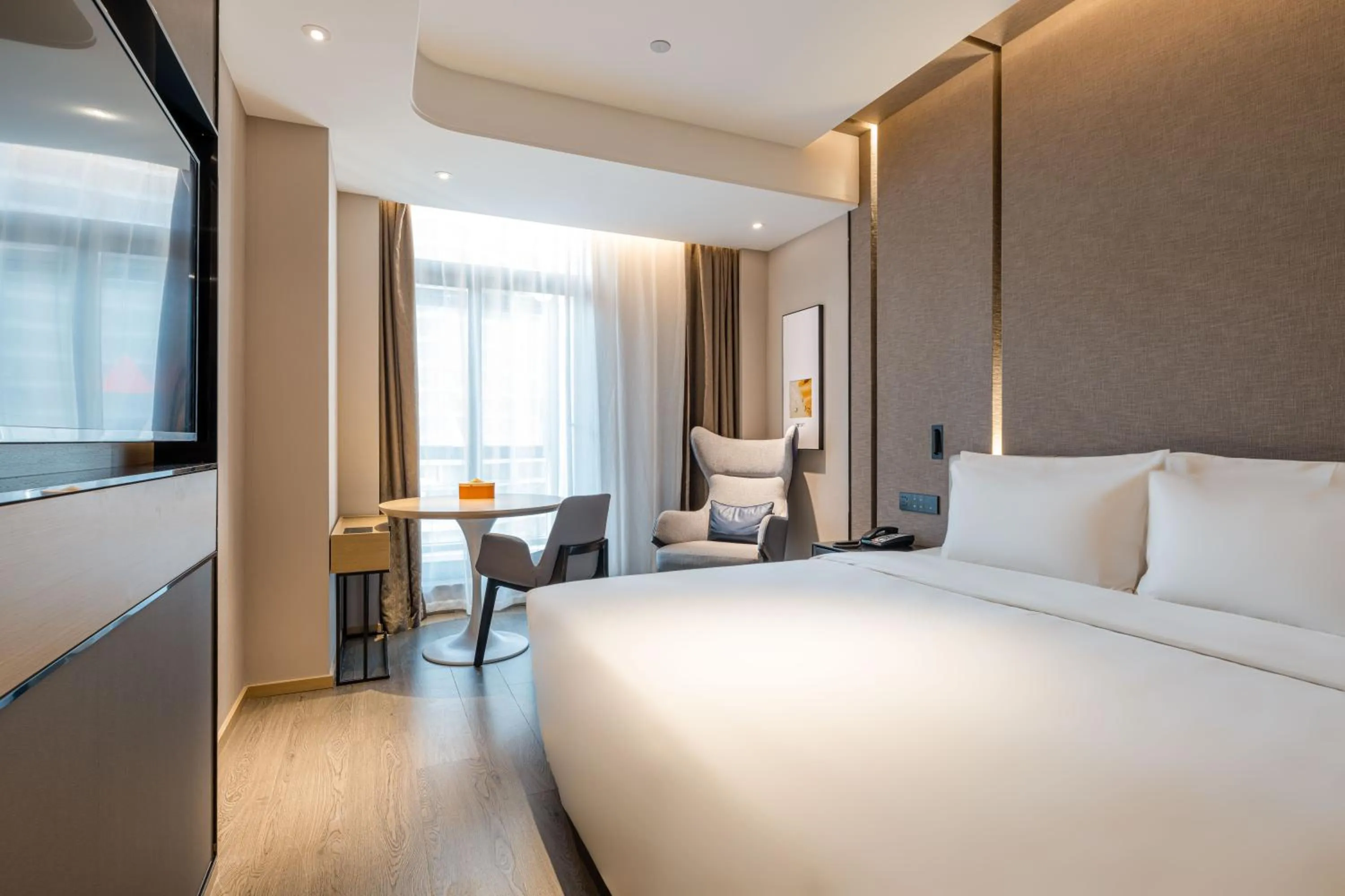 Bed in Atour Hotel Hangzhou Qianjiang Century City International Expo Center