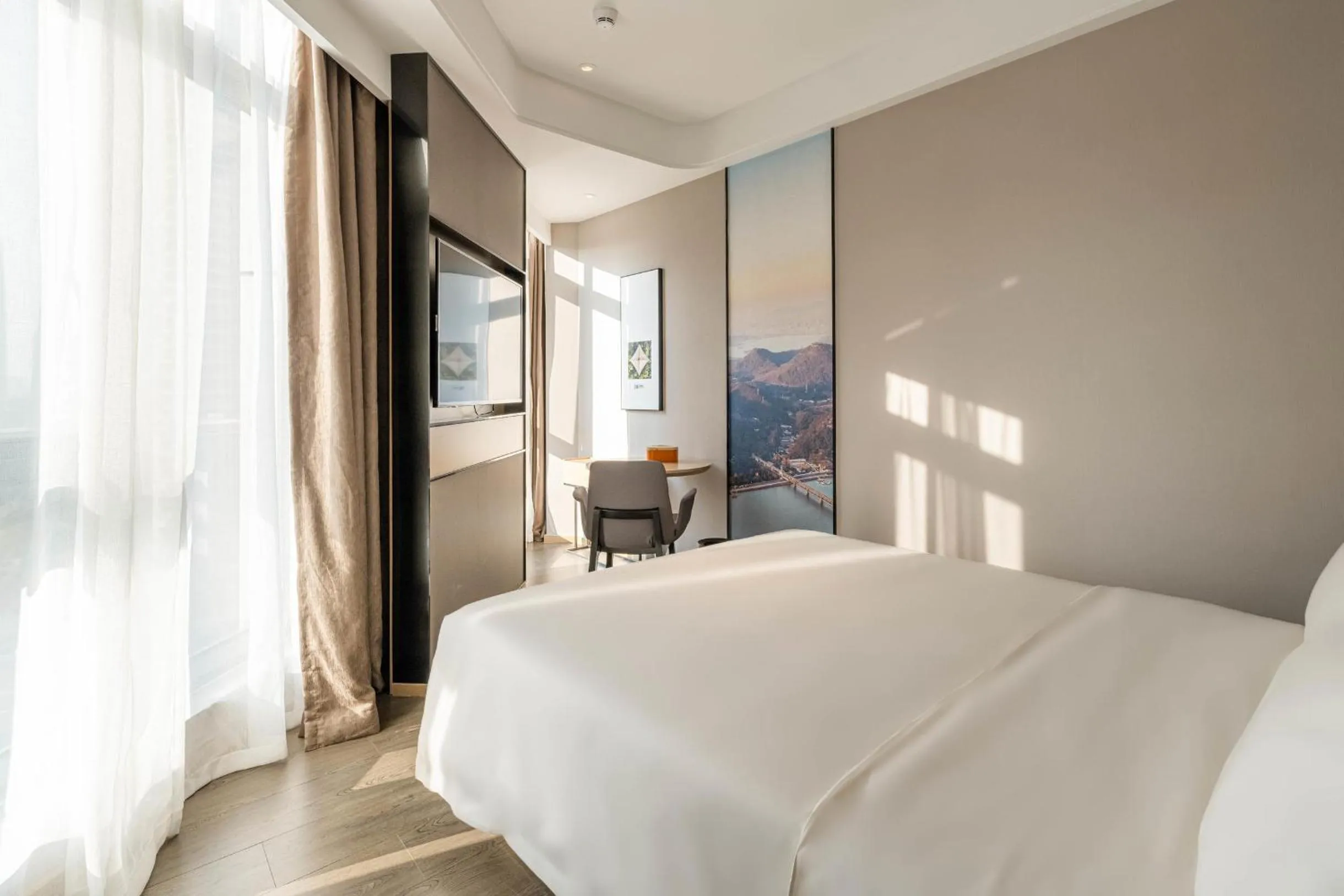 Bed in Atour Hotel Hangzhou Qianjiang Century City International Expo Center