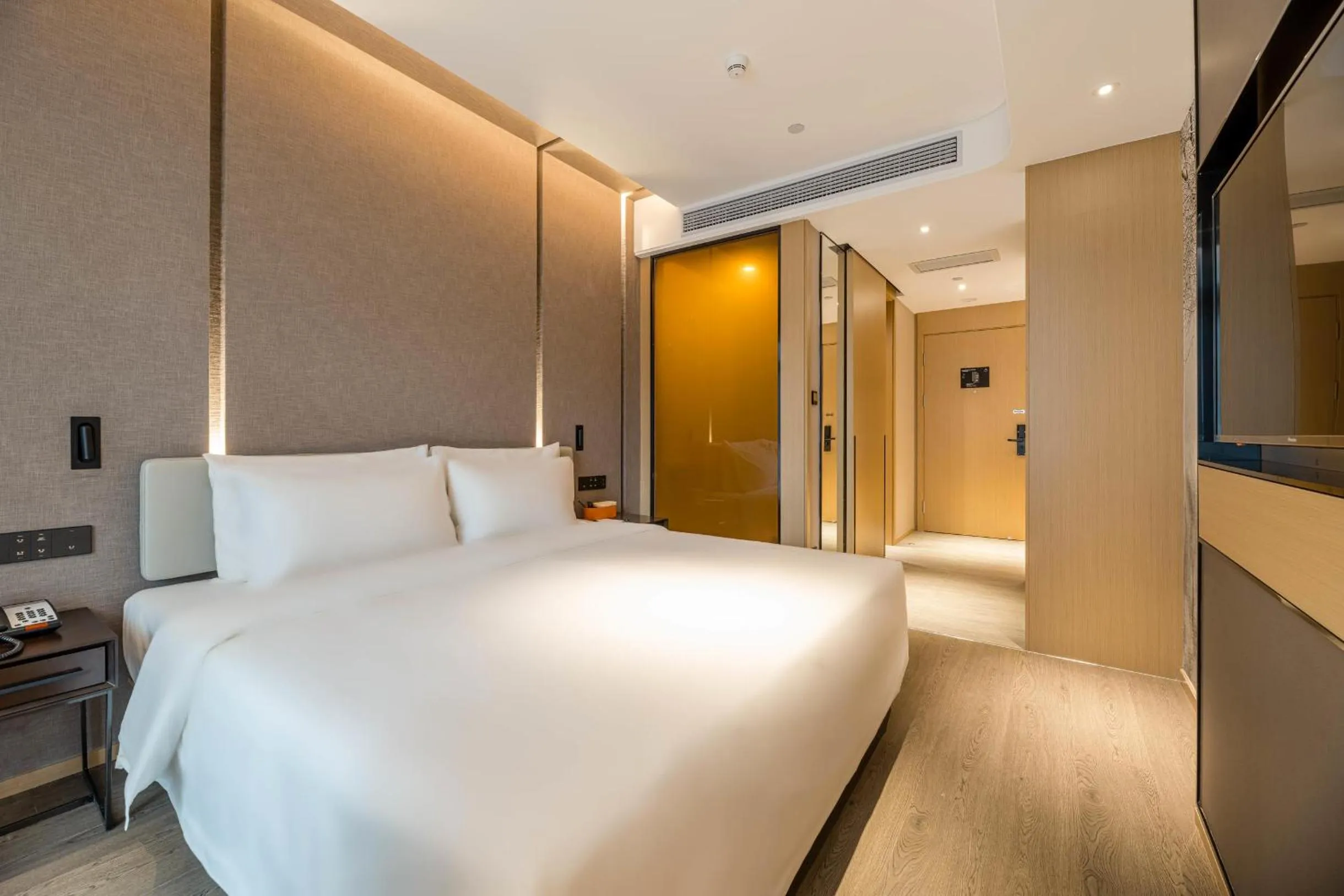 Bed in Atour Hotel Hangzhou Qianjiang Century City International Expo Center