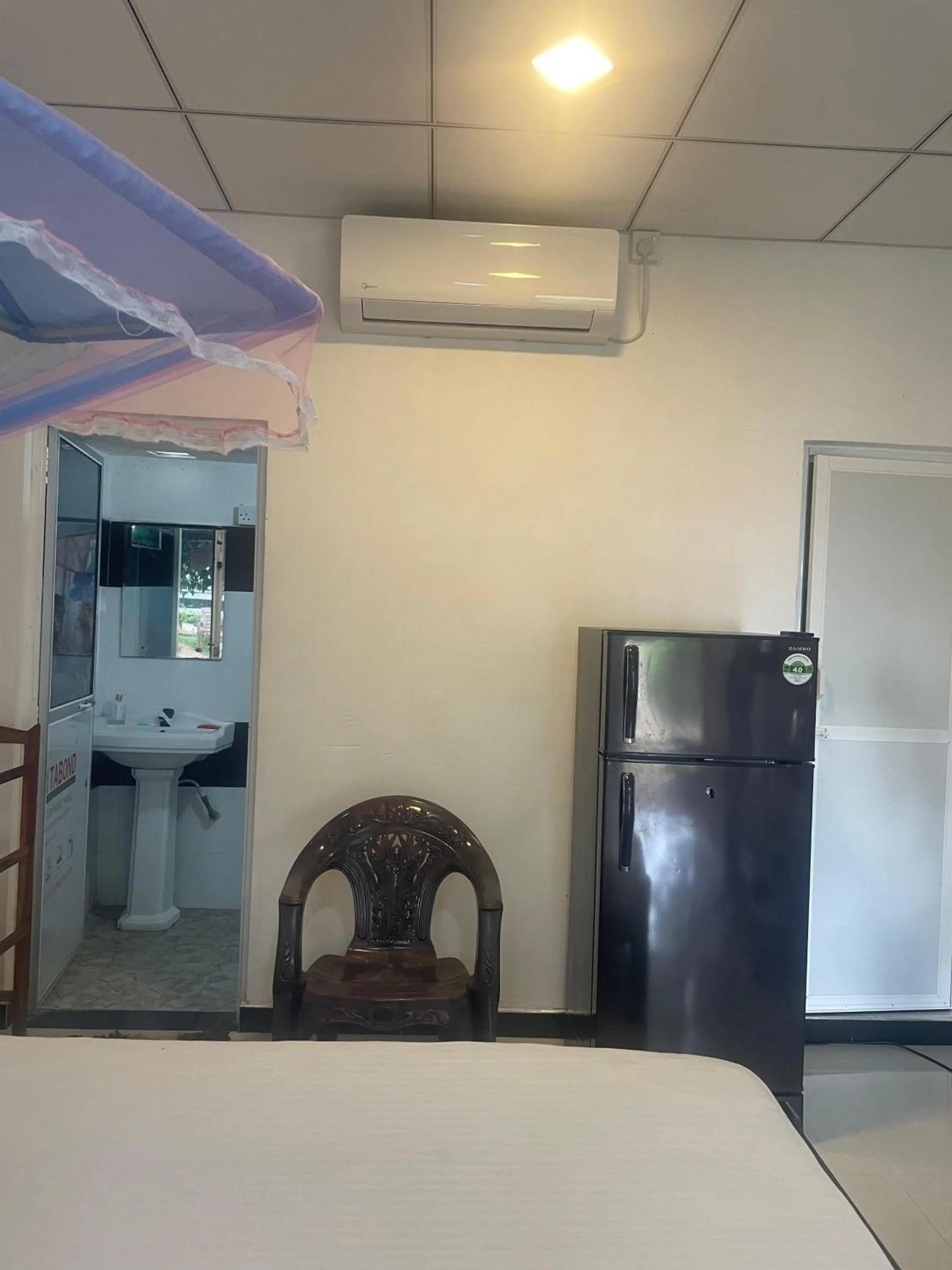 air conditioner in Ananda Home Stay and Restaurant