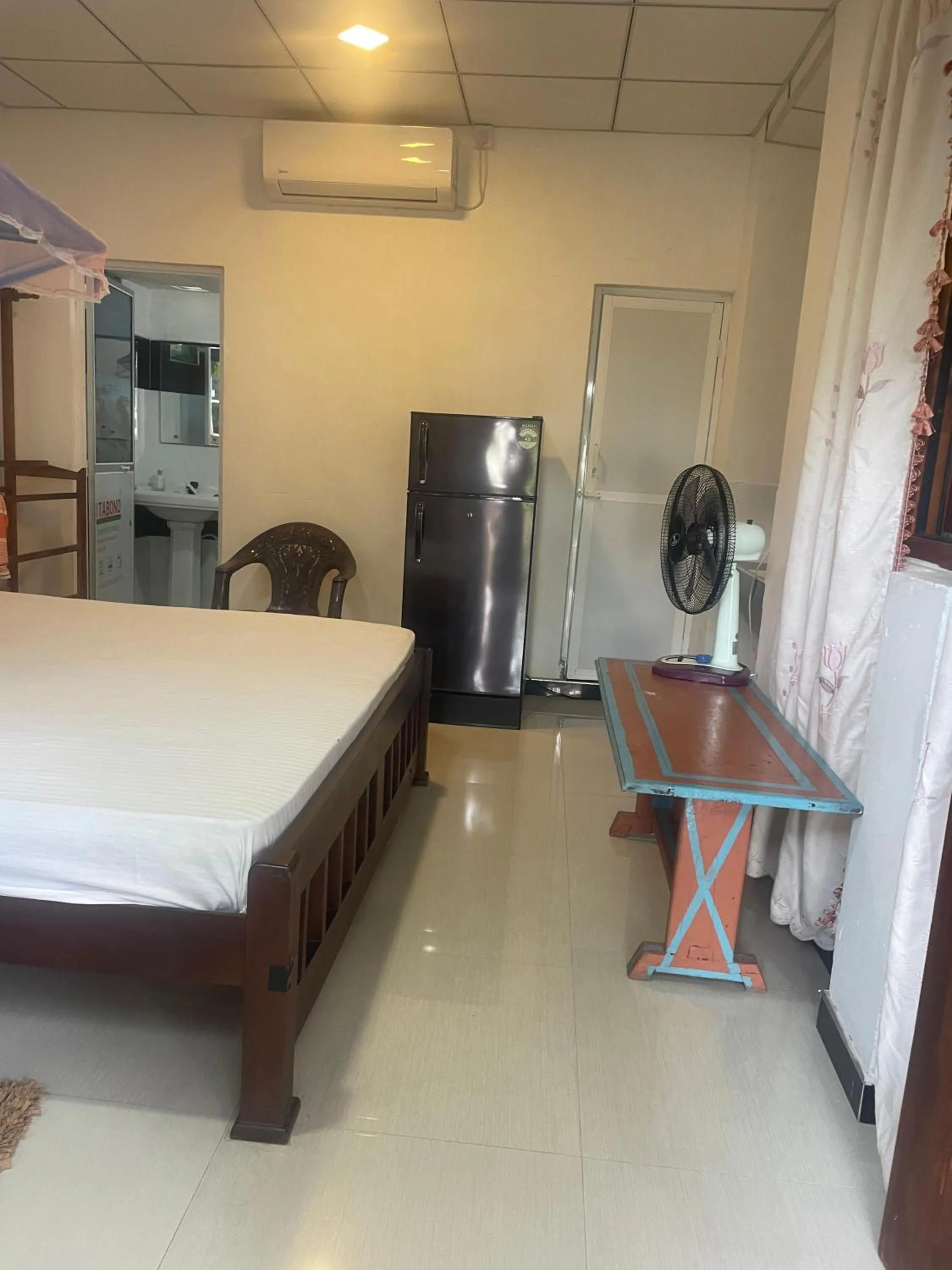 Bedroom in Ananda Home Stay and Restaurant