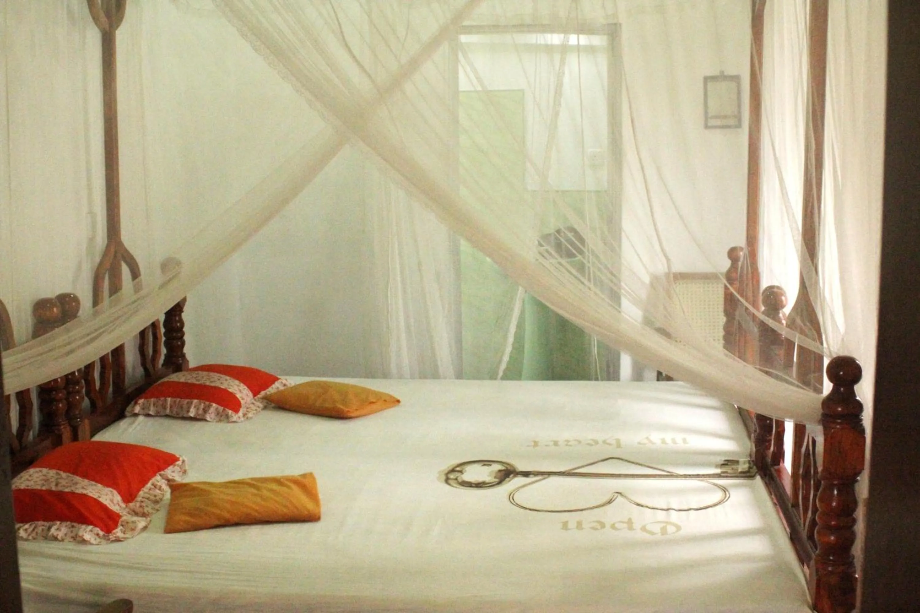 Photo of the whole room, Bed in Ananda Home Stay and Restaurant