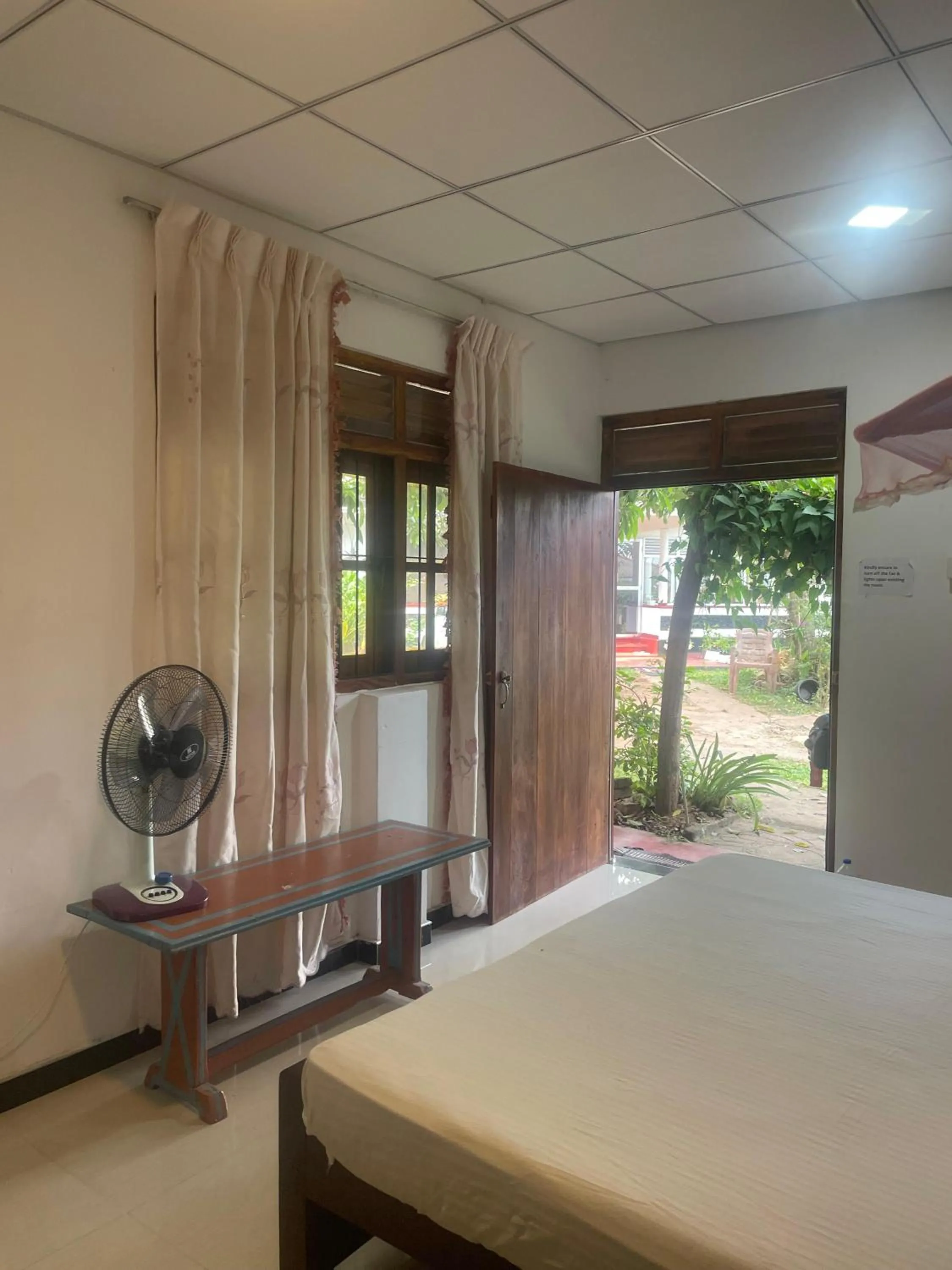 Bedroom in Ananda Home Stay and Restaurant