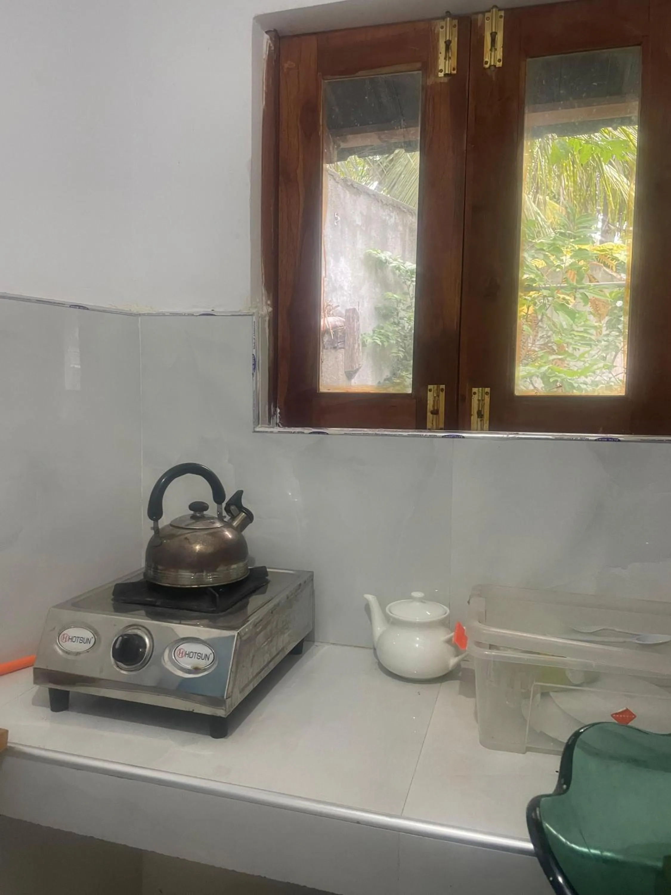 Kitchen or kitchenette in Ananda Home Stay and Restaurant