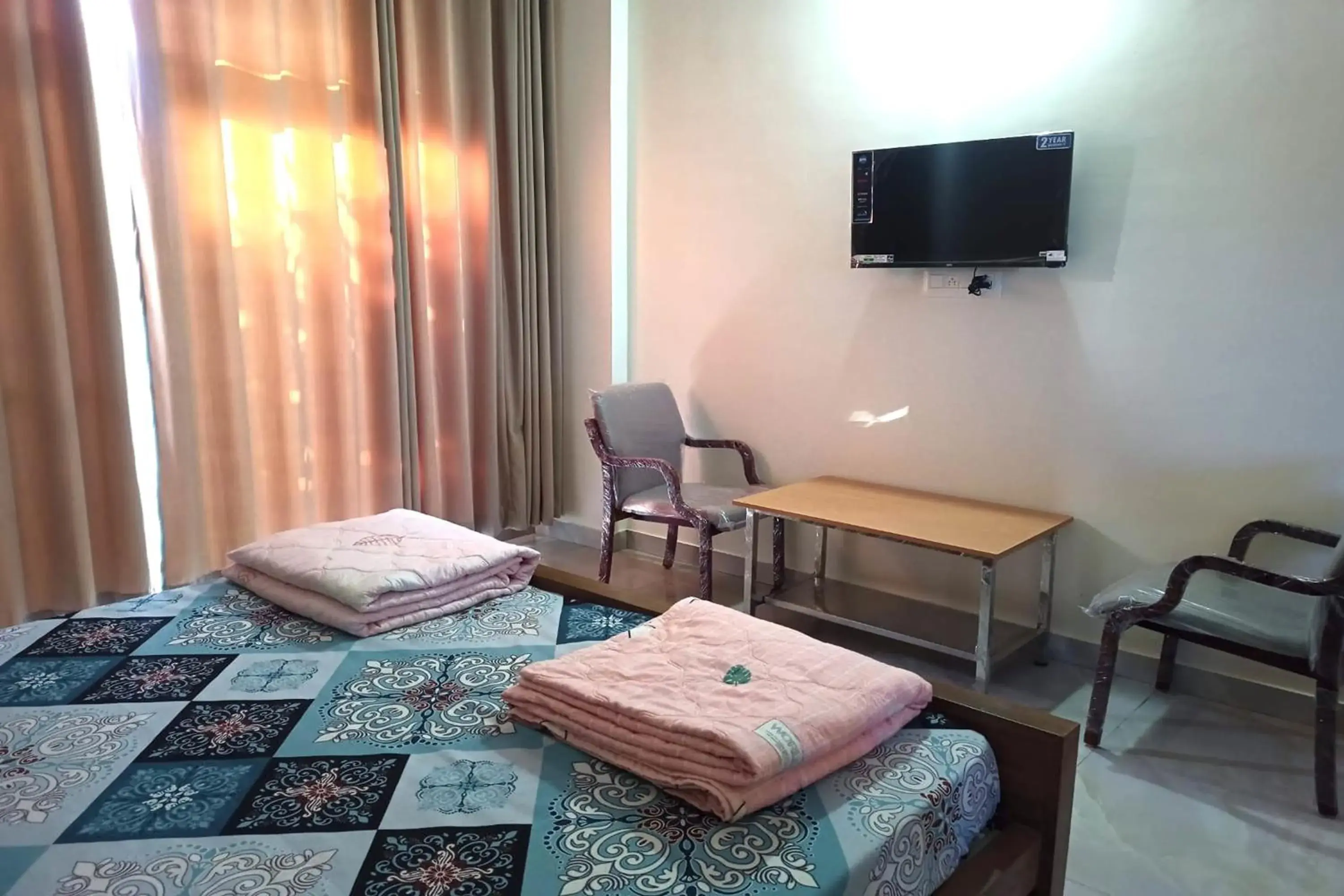 Bed in Dundi Mango Mist Resort Bed in Dundi Mango Mist Resort