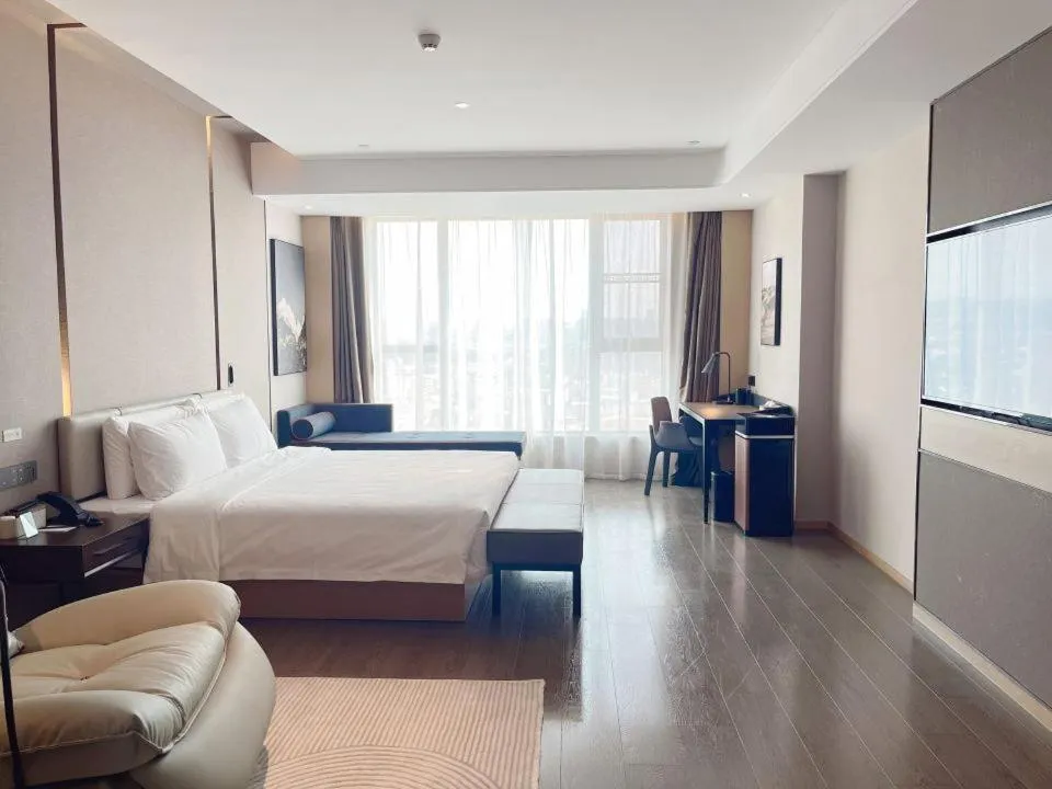Photo of the whole room, Bed in Atour Hotel Dongguan Fenggang